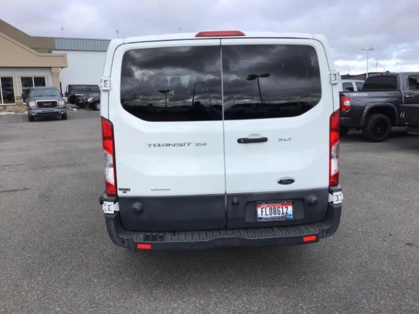 2018 WHITE /XL Ford Transit 350 Wagon Low Roof XL w/Sliding Pass. 148-in. WB (1FBZX2YG2JK) with an 3.5L V6 DOHC 24V engine, 6-Speed Automatic transmission, located at 1235 N Woodruff Ave., Idaho Falls, 83401, (208) 523-1053, 43.507172, -112.000488 - This 2018 Ford Transit Van, will seat up to 15 passengers. It has 74,000 miles. Comes with bluetooth and satellite radio. At Timberline Auto it is always easy to find a great deal on your next vehicle! Our experienced sales staff can help find the right vehicle that will fit your needs. Our knowle - Photo#3