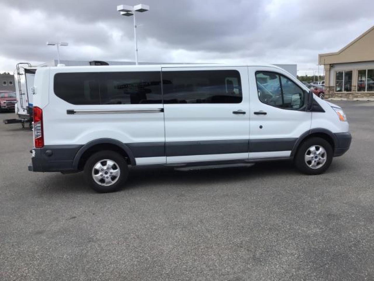 2018 WHITE /XL Ford Transit 350 Wagon Low Roof XL w/Sliding Pass. 148-in. WB (1FBZX2YG2JK) with an 3.5L V6 DOHC 24V engine, 6-Speed Automatic transmission, located at 1235 N Woodruff Ave., Idaho Falls, 83401, (208) 523-1053, 43.507172, -112.000488 - This 2018 Ford Transit Van, will seat up to 15 passengers. It has 74,000 miles. Comes with bluetooth and satellite radio. At Timberline Auto it is always easy to find a great deal on your next vehicle! Our experienced sales staff can help find the right vehicle that will fit your needs. Our knowle - Photo#5