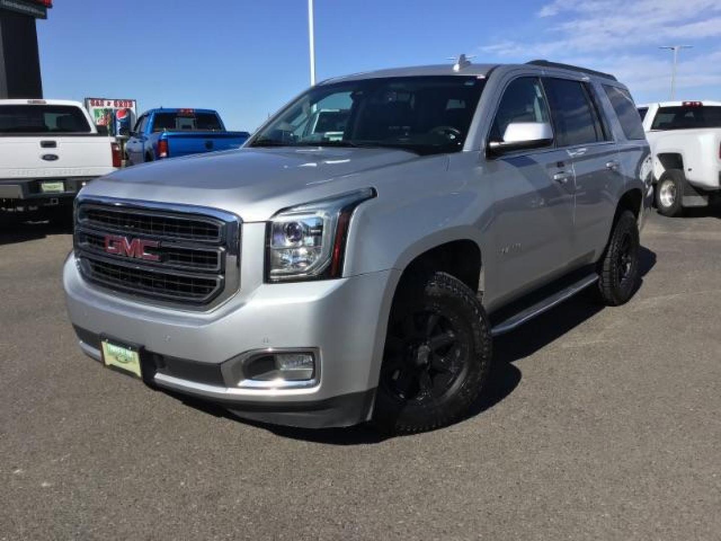 2017 Sparkling Silver Metallic /Jet Black, leather GMC Yukon SLT 4WD (1GKS2BKC4HR) with an 5.3L V8 OHV 16V FFV engine, 6-Speed Automatic transmission, located at 1235 N Woodruff Ave., Idaho Falls, 83401, (208) 523-1053, 43.507172, -112.000488 - This car is loaded with comfort features! It has 17 inch ULTRA MOTORSPORTS wheels wrapped in OPEN RANGE ALL TERRAIN tires that have 90% plus tread left. At Timberline Auto it is always easy to find a great deal on your next vehicle! Our experienced sales staff can help find the right vehicle that w - Photo#1