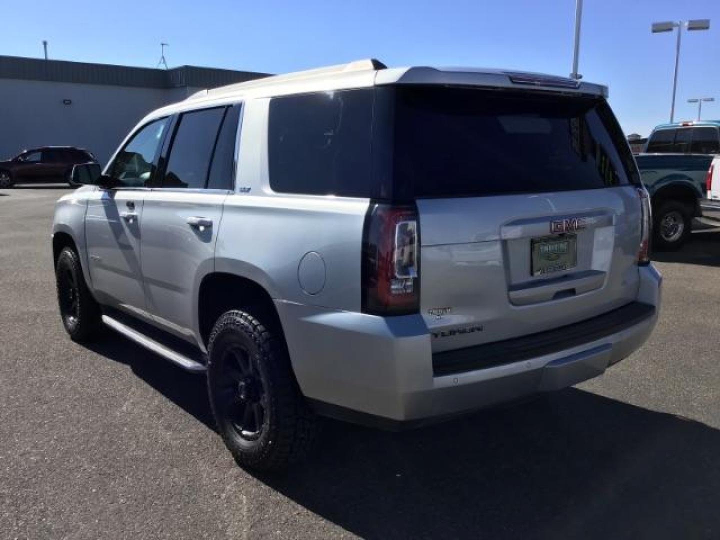 2017 Sparkling Silver Metallic /Jet Black, leather GMC Yukon SLT 4WD (1GKS2BKC4HR) with an 5.3L V8 OHV 16V FFV engine, 6-Speed Automatic transmission, located at 1235 N Woodruff Ave., Idaho Falls, 83401, (208) 523-1053, 43.507172, -112.000488 - This car is loaded with comfort features! It has 17 inch ULTRA MOTORSPORTS wheels wrapped in OPEN RANGE ALL TERRAIN tires that have 90% plus tread left. At Timberline Auto it is always easy to find a great deal on your next vehicle! Our experienced sales staff can help find the right vehicle that w - Photo#3