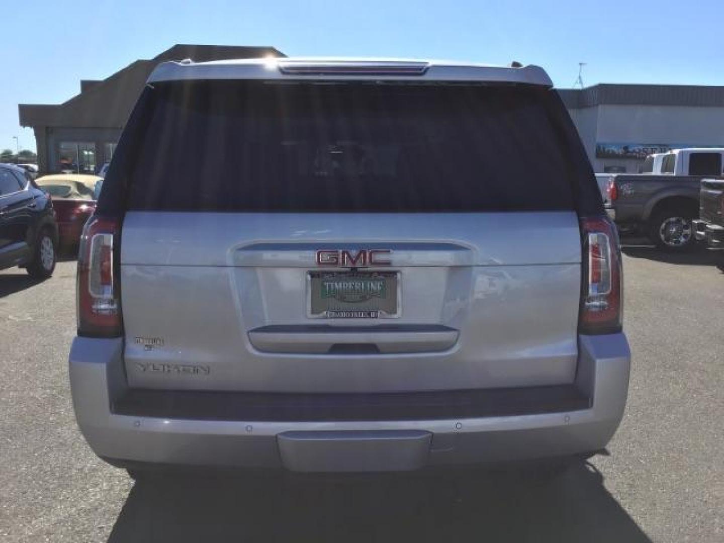 2017 Sparkling Silver Metallic /Jet Black, leather GMC Yukon SLT 4WD (1GKS2BKC4HR) with an 5.3L V8 OHV 16V FFV engine, 6-Speed Automatic transmission, located at 1235 N Woodruff Ave., Idaho Falls, 83401, (208) 523-1053, 43.507172, -112.000488 - This car is loaded with comfort features! It has 17 inch ULTRA MOTORSPORTS wheels wrapped in OPEN RANGE ALL TERRAIN tires that have 90% plus tread left. At Timberline Auto it is always easy to find a great deal on your next vehicle! Our experienced sales staff can help find the right vehicle that w - Photo#4