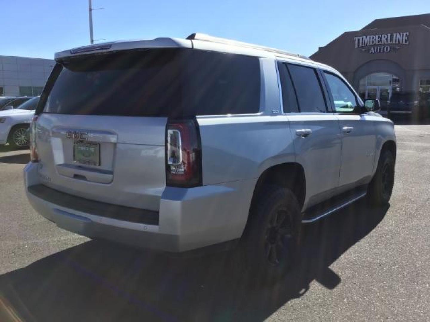 2017 Sparkling Silver Metallic /Jet Black, leather GMC Yukon SLT 4WD (1GKS2BKC4HR) with an 5.3L V8 OHV 16V FFV engine, 6-Speed Automatic transmission, located at 1235 N Woodruff Ave., Idaho Falls, 83401, (208) 523-1053, 43.507172, -112.000488 - This car is loaded with comfort features! It has 17 inch ULTRA MOTORSPORTS wheels wrapped in OPEN RANGE ALL TERRAIN tires that have 90% plus tread left. At Timberline Auto it is always easy to find a great deal on your next vehicle! Our experienced sales staff can help find the right vehicle that w - Photo#5