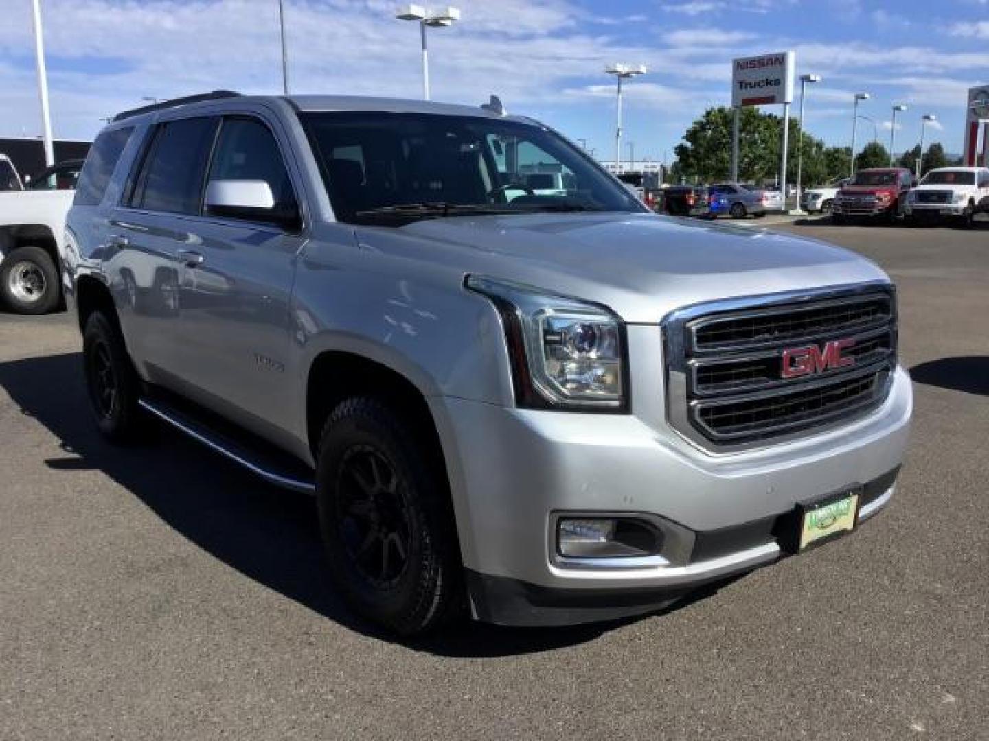 2017 Sparkling Silver Metallic /Jet Black, leather GMC Yukon SLT 4WD (1GKS2BKC4HR) with an 5.3L V8 OHV 16V FFV engine, 6-Speed Automatic transmission, located at 1235 N Woodruff Ave., Idaho Falls, 83401, (208) 523-1053, 43.507172, -112.000488 - This car is loaded with comfort features! It has 17 inch ULTRA MOTORSPORTS wheels wrapped in OPEN RANGE ALL TERRAIN tires that have 90% plus tread left. At Timberline Auto it is always easy to find a great deal on your next vehicle! Our experienced sales staff can help find the right vehicle that w - Photo#7