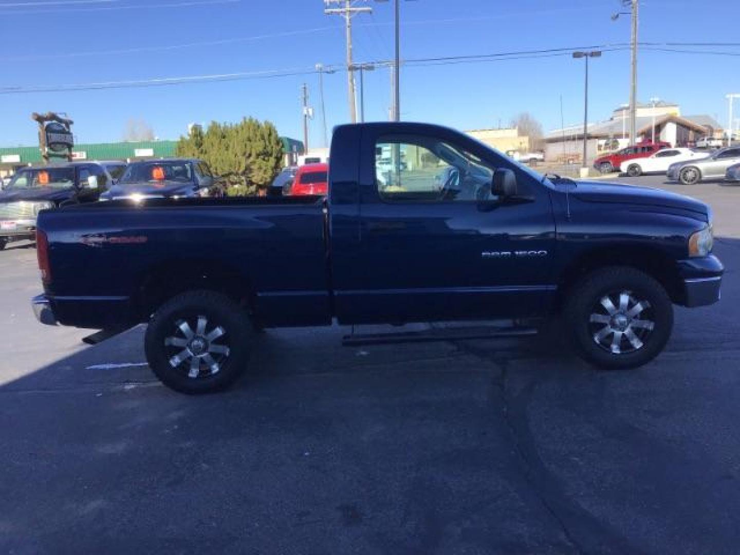 2003 Atlantic Blue Pearlcoat /Dark Slate Gray Cloth Interior Dodge Ram 1500 SLT Short Bed 4WD (1D7HU16NX3J) with an 4.7L V8 SOHC 16V engine, 5-Speed Automatic transmission, located at 1235 N Woodruff Ave., Idaho Falls, 83401, (208) 523-1053, 43.507172, -112.000488 - This 2003 Dodge Ram 1500 single cab, has 149,000. Comes with cloth interior, 4x4, cruise control, power locks, and power windows. At Timberline Auto it is always easy to find a great deal on your next vehicle! Our experienced sales staff can help find the right vehicle will fit your needs. Our knowl - Photo#5