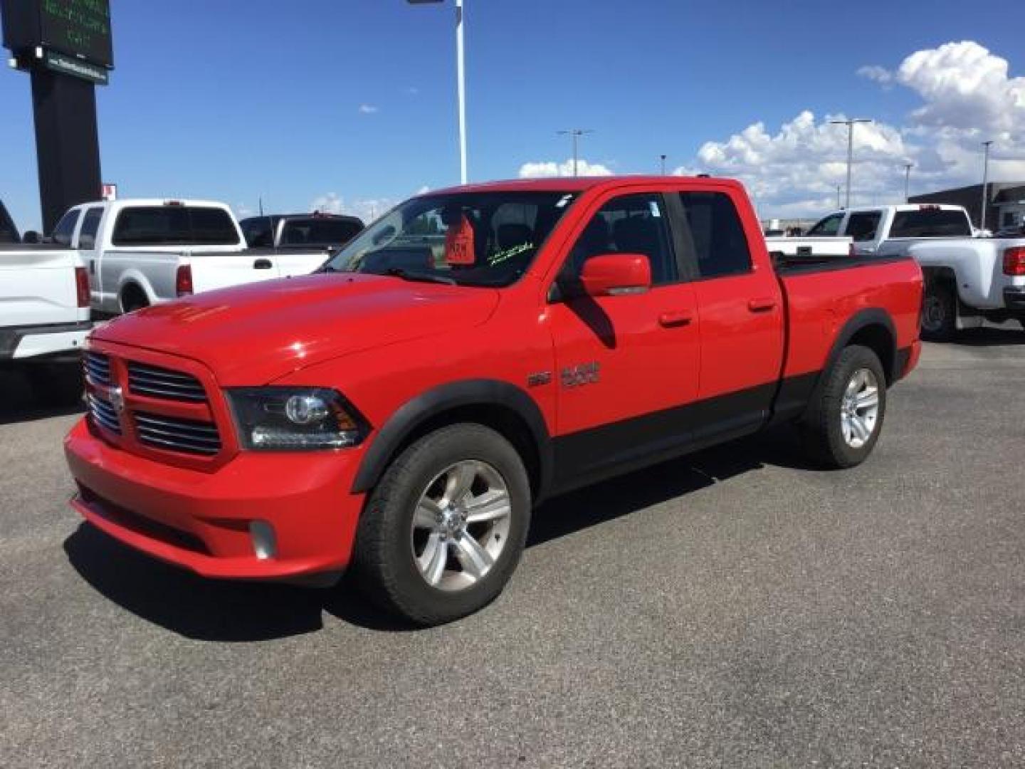 2013 Flame Red /Black Cloth Interior RAM 1500 Sport Quad Cab 4WD (1C6RR7HT4DS) with an 5.7L V8 OHV 16V engine, 6-Speed Automatic transmission, located at 1235 N Woodruff Ave., Idaho Falls, 83401, (208) 523-1053, 43.507172, -112.000488 - Leather, sport package, 4X4, Bluetooth, Alpine Sound System, heated and cooled seats, heated steering wheel, tow package, 6.6' bed, Tonneau cover. At Timberline Auto it is always easy to find a great deal on your next vehicle! Our experienced sales staff can help find the right vehicle that will fi - Photo#0