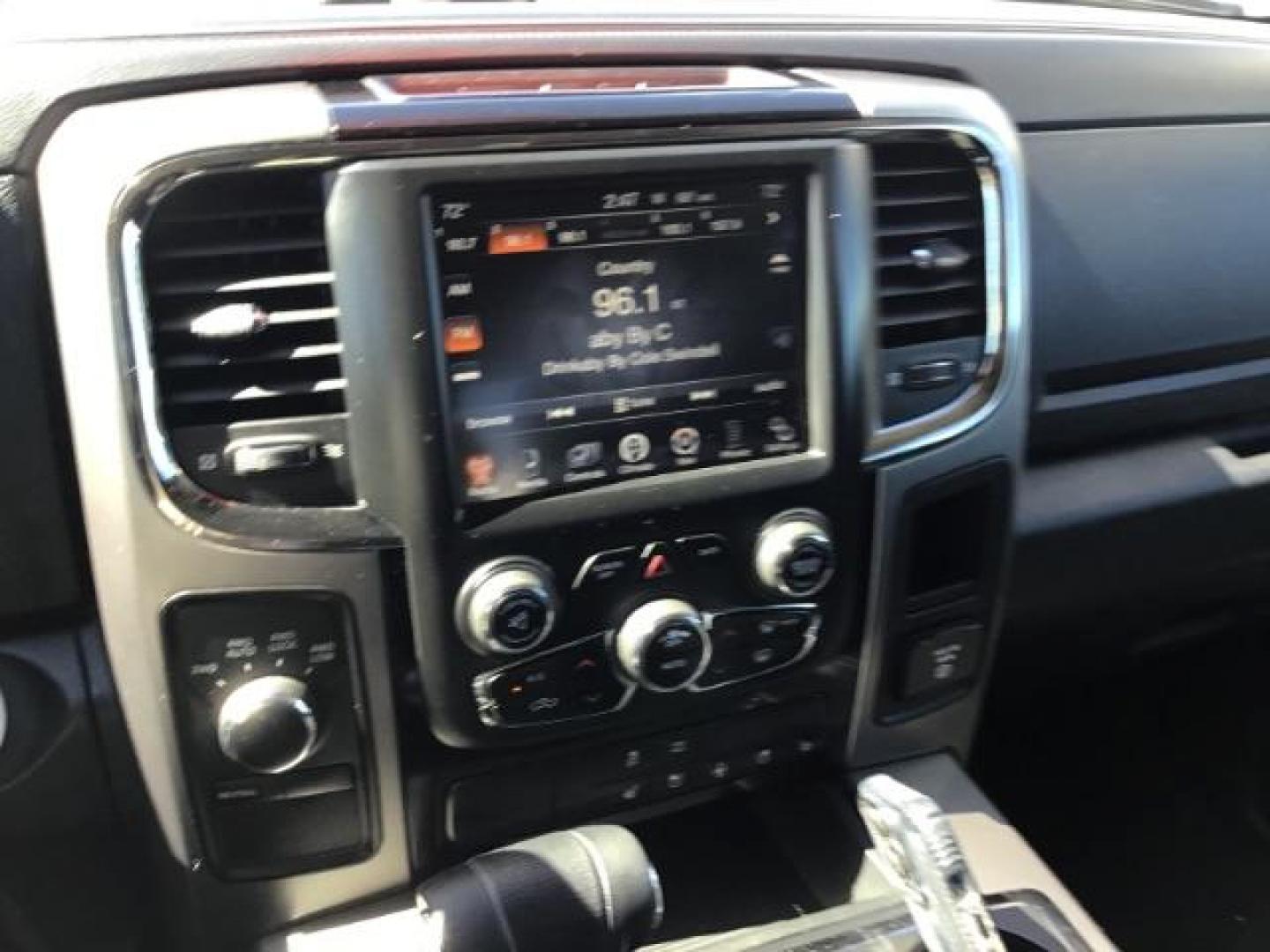 2013 Flame Red /Black Cloth Interior RAM 1500 Sport Quad Cab 4WD (1C6RR7HT4DS) with an 5.7L V8 OHV 16V engine, 6-Speed Automatic transmission, located at 1235 N Woodruff Ave., Idaho Falls, 83401, (208) 523-1053, 43.507172, -112.000488 - Leather, sport package, 4X4, Bluetooth, Alpine Sound System, heated and cooled seats, heated steering wheel, tow package, 6.6' bed, Tonneau cover. At Timberline Auto it is always easy to find a great deal on your next vehicle! Our experienced sales staff can help find the right vehicle that will fi - Photo#10