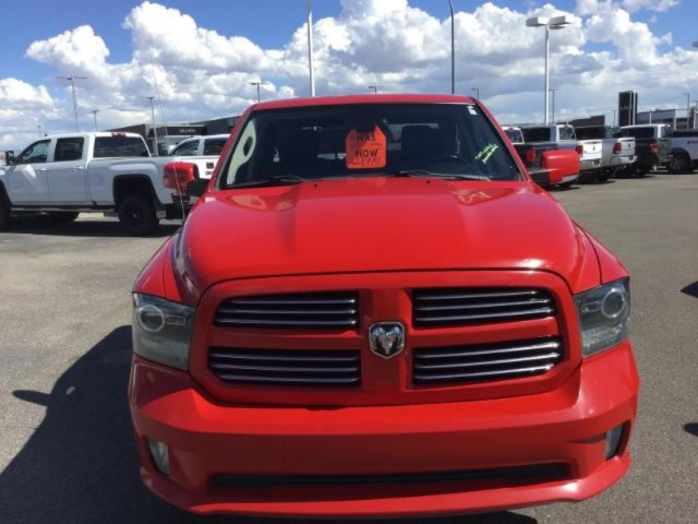 2013 Flame Red /Black Cloth Interior RAM 1500 Sport Quad Cab 4WD (1C6RR7HT4DS) with an 5.7L V8 OHV 16V engine, 6-Speed Automatic transmission, located at 1235 N Woodruff Ave., Idaho Falls, 83401, (208) 523-1053, 43.507172, -112.000488 - Leather, sport package, 4X4, Bluetooth, Alpine Sound System, heated and cooled seats, heated steering wheel, tow package, 6.6' bed, Tonneau cover. At Timberline Auto it is always easy to find a great deal on your next vehicle! Our experienced sales staff can help find the right vehicle that will fi - Photo#8