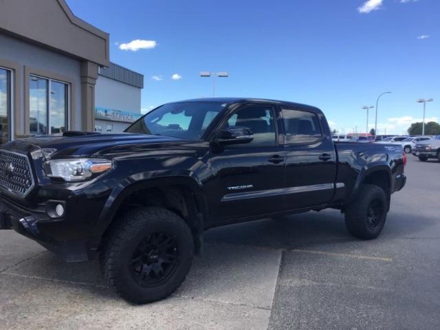 2018 Midnight Black Metallic /LEATHER Toyota Tacoma SR5 Double Cab Super Long Bed V6 6AT 4WD (5TFDZ5BN9JX) with an 3.5L V6 DOHC 24V engine, 6-Speed Automatic transmission, located at 1235 N Woodruff Ave., Idaho Falls, 83401, (208) 523-1053, 43.507172, -112.000488 - Crew cab, long box, 4X4, leather interior, heated seats, power sliding rear window, factory bed liner, TRD Sport package, full size spare tire, complete front clear bra. Hard to find! - Photo#0