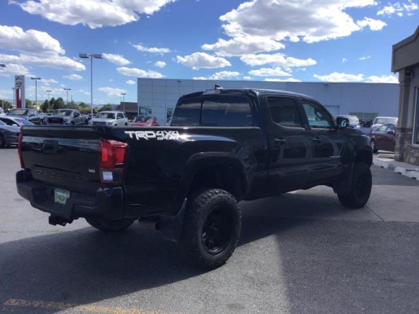 2018 Midnight Black Metallic /LEATHER Toyota Tacoma SR5 Double Cab Super Long Bed V6 6AT 4WD (5TFDZ5BN9JX) with an 3.5L V6 DOHC 24V engine, 6-Speed Automatic transmission, located at 1235 N Woodruff Ave., Idaho Falls, 83401, (208) 523-1053, 43.507172, -112.000488 - Crew cab, long box, 4X4, leather interior, heated seats, power sliding rear window, factory bed liner, TRD Sport package, full size spare tire, complete front clear bra. Hard to find! - Photo#4