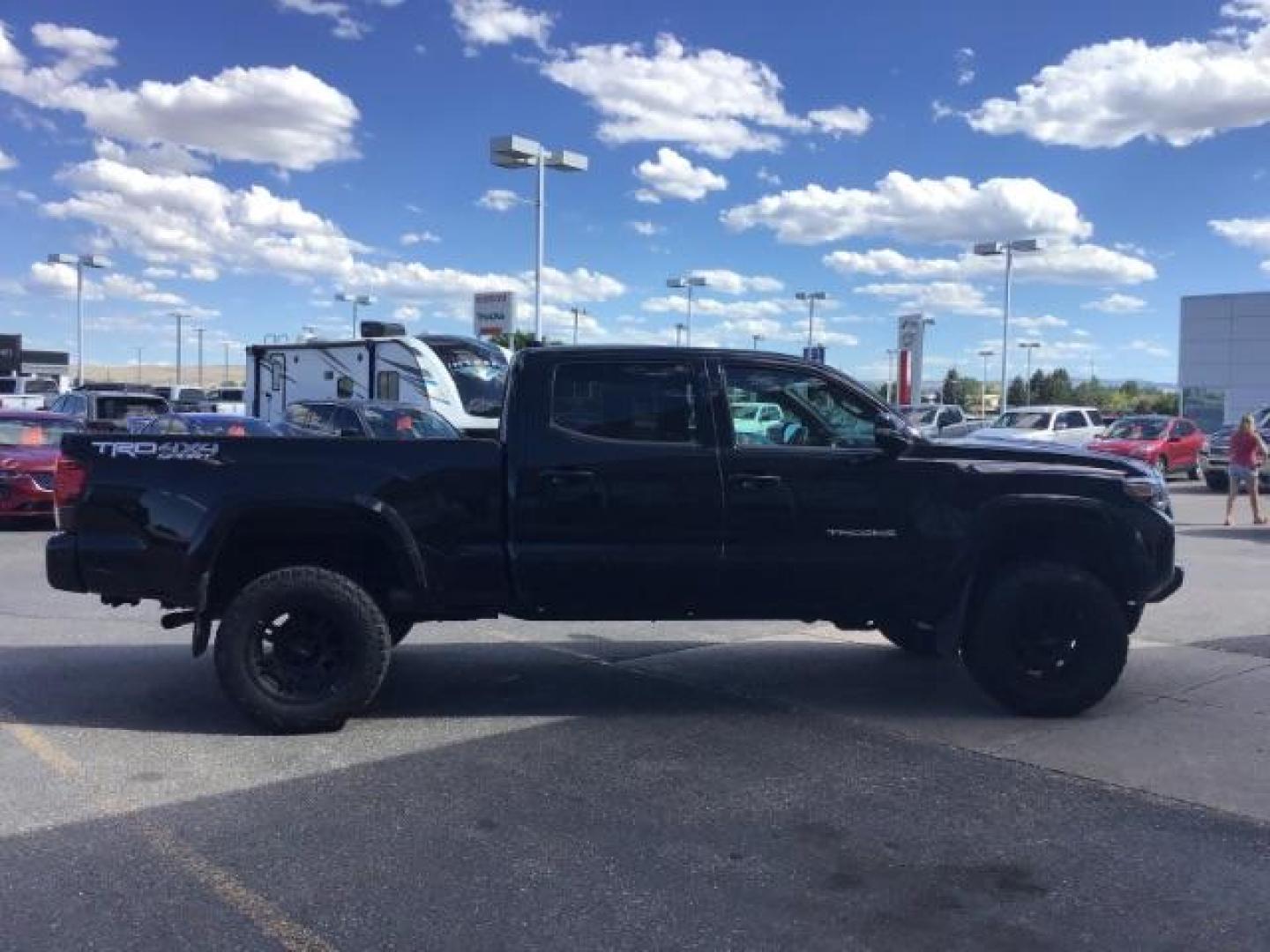 2018 Midnight Black Metallic /LEATHER Toyota Tacoma SR5 Double Cab Super Long Bed V6 6AT 4WD (5TFDZ5BN9JX) with an 3.5L V6 DOHC 24V engine, 6-Speed Automatic transmission, located at 1235 N Woodruff Ave., Idaho Falls, 83401, (208) 523-1053, 43.507172, -112.000488 - Crew cab, long box, 4X4, leather interior, heated seats, power sliding rear window, factory bed liner, TRD Sport package, full size spare tire, complete front clear bra. Hard to find! - Photo#5