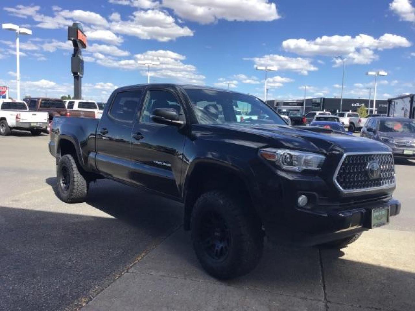 2018 Midnight Black Metallic /LEATHER Toyota Tacoma SR5 Double Cab Super Long Bed V6 6AT 4WD (5TFDZ5BN9JX) with an 3.5L V6 DOHC 24V engine, 6-Speed Automatic transmission, located at 1235 N Woodruff Ave., Idaho Falls, 83401, (208) 523-1053, 43.507172, -112.000488 - Crew cab, long box, 4X4, leather interior, heated seats, power sliding rear window, factory bed liner, TRD Sport package, full size spare tire, complete front clear bra. Hard to find! - Photo#6