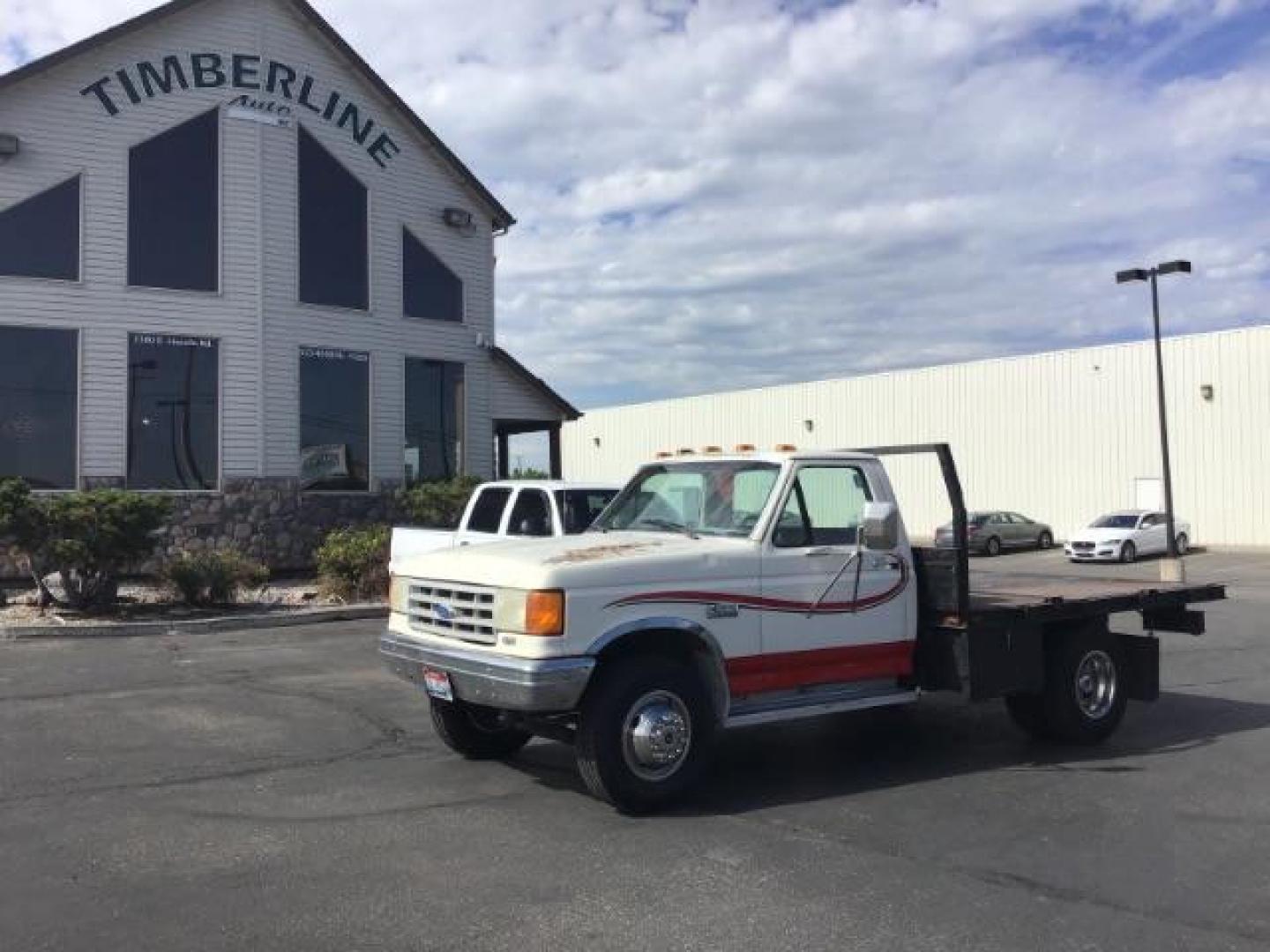 1989 Ford F-450 SD Chassis Cab 2WD (2FDLF47G6KC) with an 7.5L V8 engine, located at 1235 N Woodruff Ave., Idaho Falls, 83401, (208) 523-1053, 43.507172, -112.000488 - This 1989 Ford F450, has a 8 foot flat bed and a 5 speed manual transmission. At Timberline Auto it is always easy to find a great deal on your next vehicle! Our experienced sales staff can help find the right vehicle will fit your needs. Our knowledgeable finance department has options for almost a - Photo#0