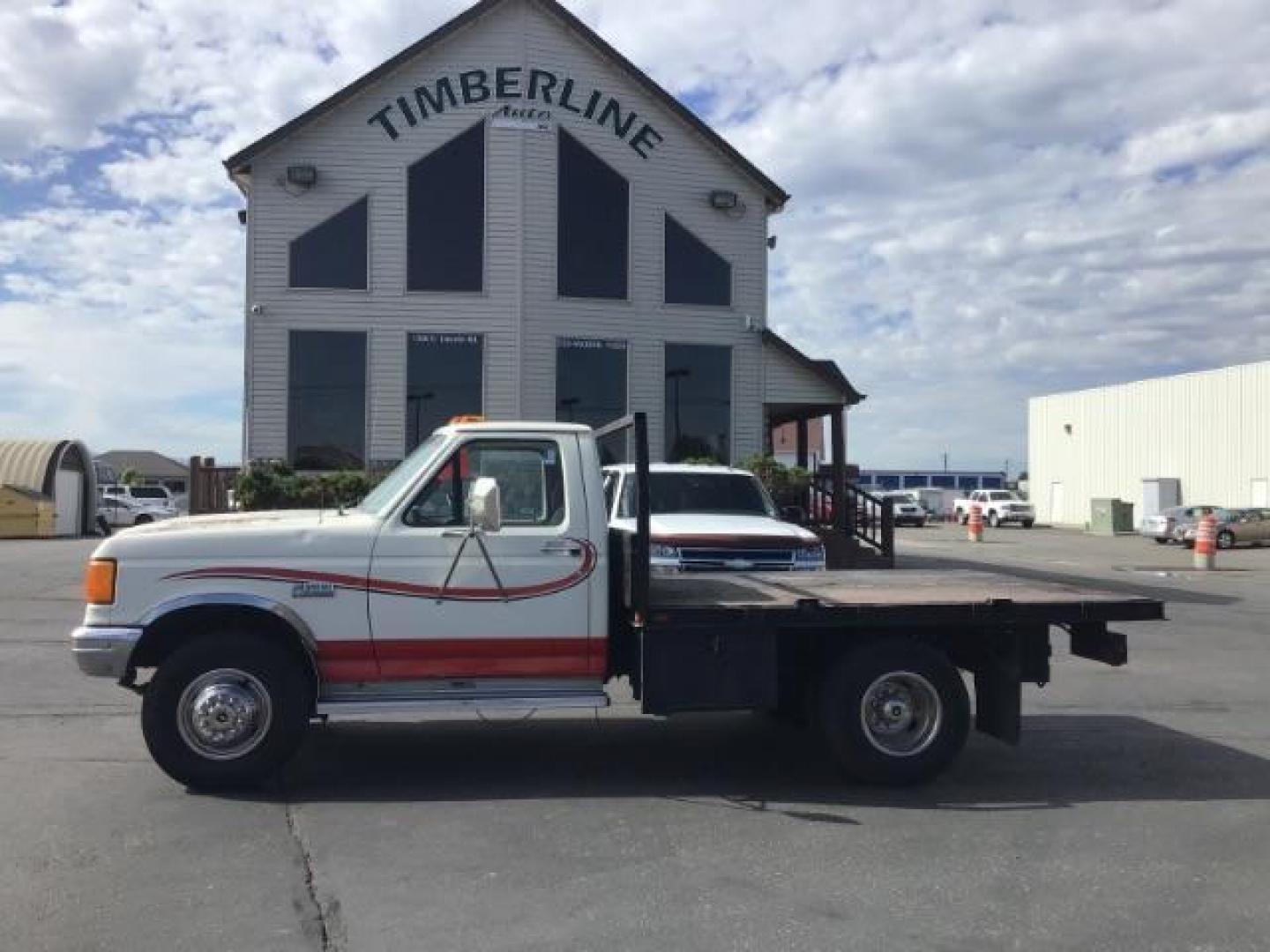 1989 Ford F-450 SD Chassis Cab 2WD (2FDLF47G6KC) with an 7.5L V8 engine, located at 1235 N Woodruff Ave., Idaho Falls, 83401, (208) 523-1053, 43.507172, -112.000488 - This 1989 Ford F450, has a 8 foot flat bed and a 5 speed manual transmission. At Timberline Auto it is always easy to find a great deal on your next vehicle! Our experienced sales staff can help find the right vehicle will fit your needs. Our knowledgeable finance department has options for almost a - Photo#1