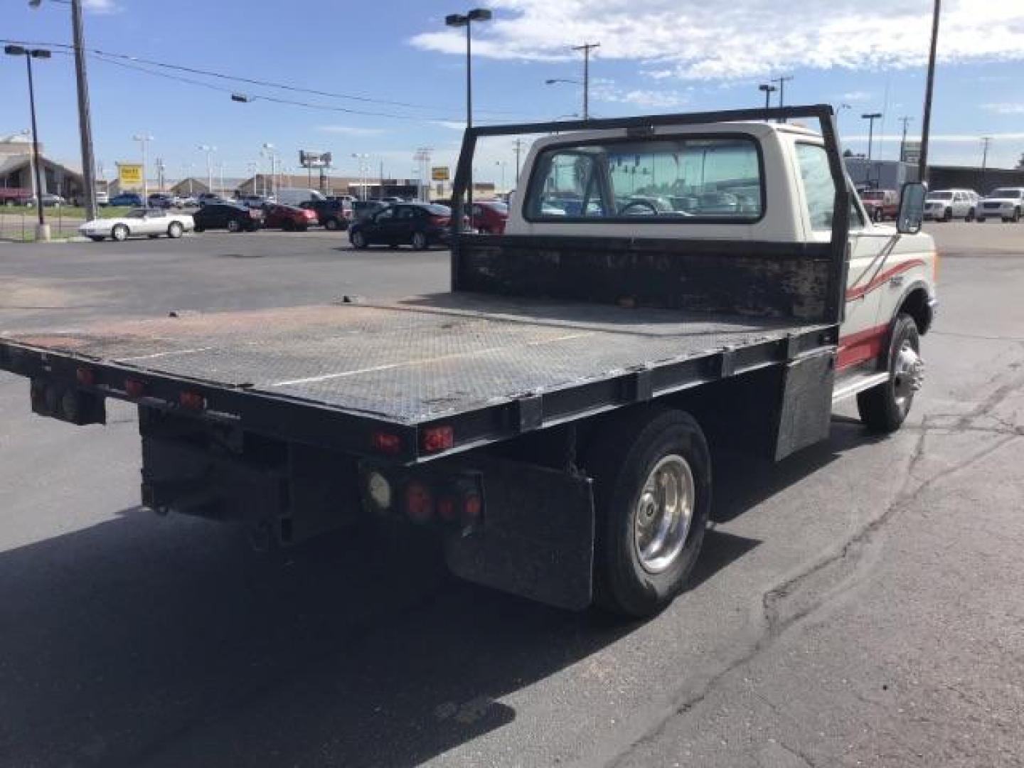 1989 Ford F-450 SD Chassis Cab 2WD (2FDLF47G6KC) with an 7.5L V8 engine, located at 1235 N Woodruff Ave., Idaho Falls, 83401, (208) 523-1053, 43.507172, -112.000488 - This 1989 Ford F450, has a 8 foot flat bed and a 5 speed manual transmission. At Timberline Auto it is always easy to find a great deal on your next vehicle! Our experienced sales staff can help find the right vehicle will fit your needs. Our knowledgeable finance department has options for almost a - Photo#3