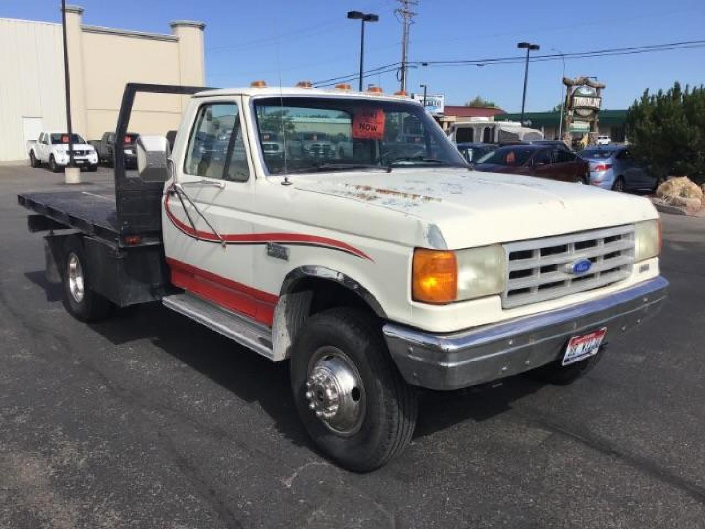 1989 Ford F-450 SD Chassis Cab 2WD (2FDLF47G6KC) with an 7.5L V8 engine, located at 1235 N Woodruff Ave., Idaho Falls, 83401, (208) 523-1053, 43.507172, -112.000488 - This 1989 Ford F450, has a 8 foot flat bed and a 5 speed manual transmission. At Timberline Auto it is always easy to find a great deal on your next vehicle! Our experienced sales staff can help find the right vehicle will fit your needs. Our knowledgeable finance department has options for almost a - Photo#5