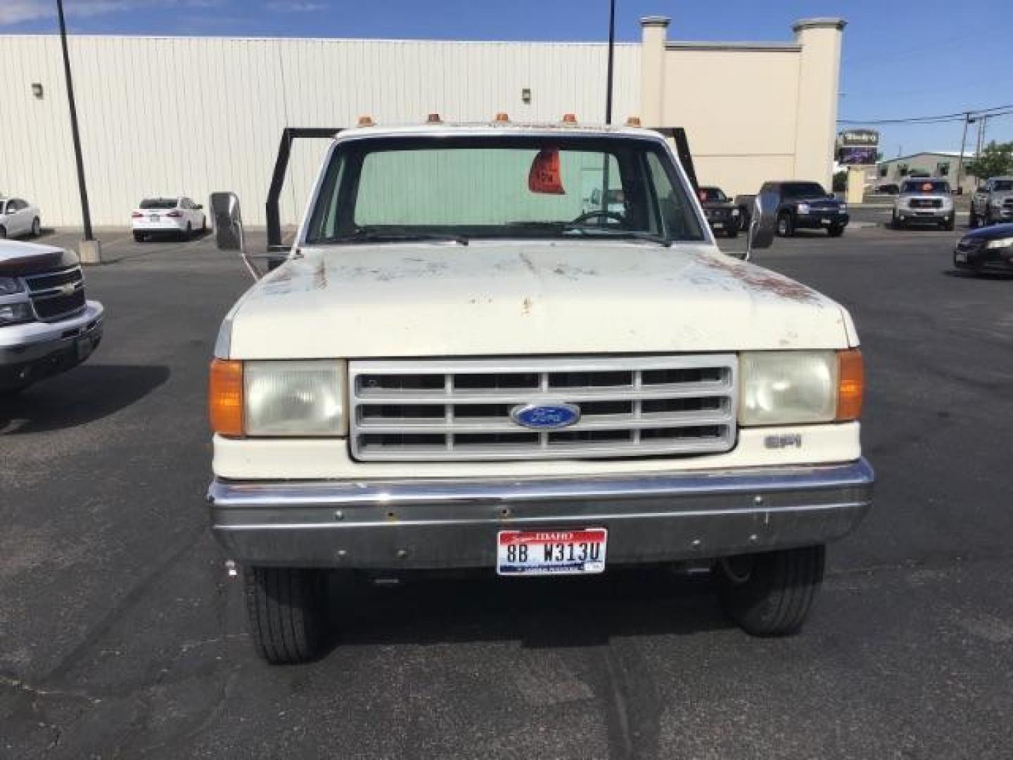 1989 Ford F-450 SD Chassis Cab 2WD (2FDLF47G6KC) with an 7.5L V8 engine, located at 1235 N Woodruff Ave., Idaho Falls, 83401, (208) 523-1053, 43.507172, -112.000488 - This 1989 Ford F450, has a 8 foot flat bed and a 5 speed manual transmission. At Timberline Auto it is always easy to find a great deal on your next vehicle! Our experienced sales staff can help find the right vehicle will fit your needs. Our knowledgeable finance department has options for almost a - Photo#6