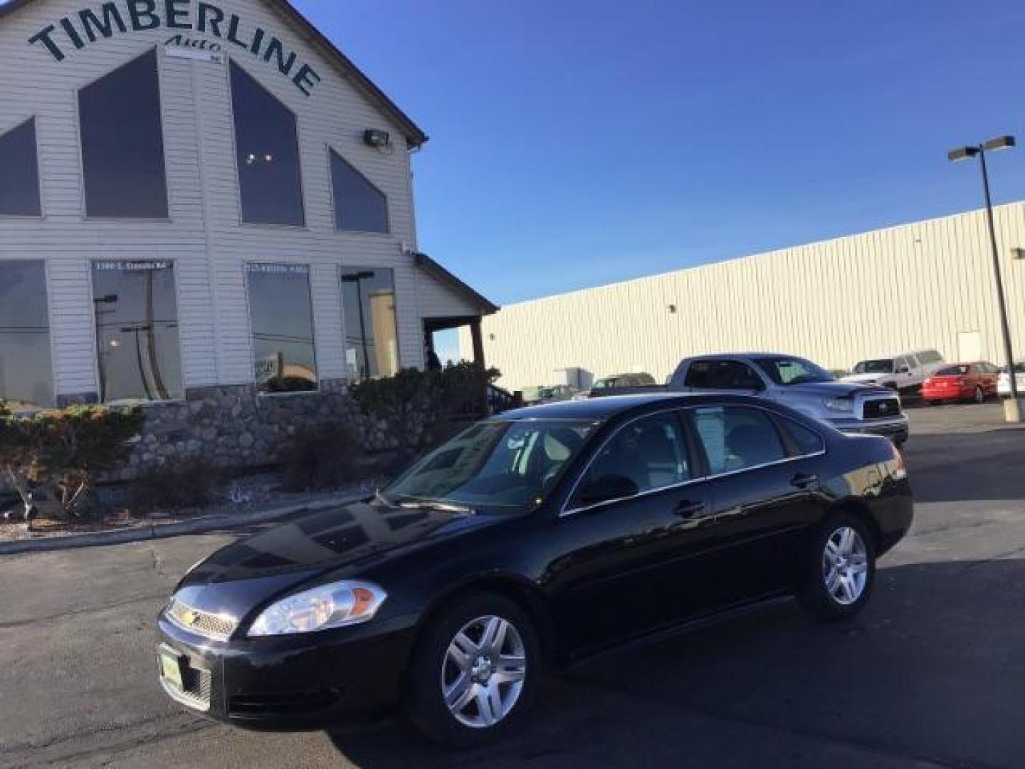 2015 BLACK /CLOTH Chevrolet Impala Limited LT (2G1WB5E30F1) with an 3.6L V6 DOHC 16V FFV engine, 6-Speed Automatic transmission, located at 1235 N Woodruff Ave., Idaho Falls, 83401, (208) 523-1053, 43.507172, -112.000488 - Photo#0