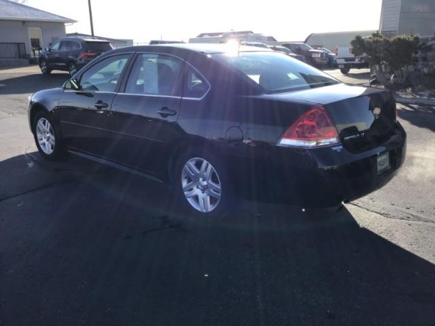 2015 BLACK /CLOTH Chevrolet Impala Limited LT (2G1WB5E30F1) with an 3.6L V6 DOHC 16V FFV engine, 6-Speed Automatic transmission, located at 1235 N Woodruff Ave., Idaho Falls, 83401, (208) 523-1053, 43.507172, -112.000488 - Photo#2