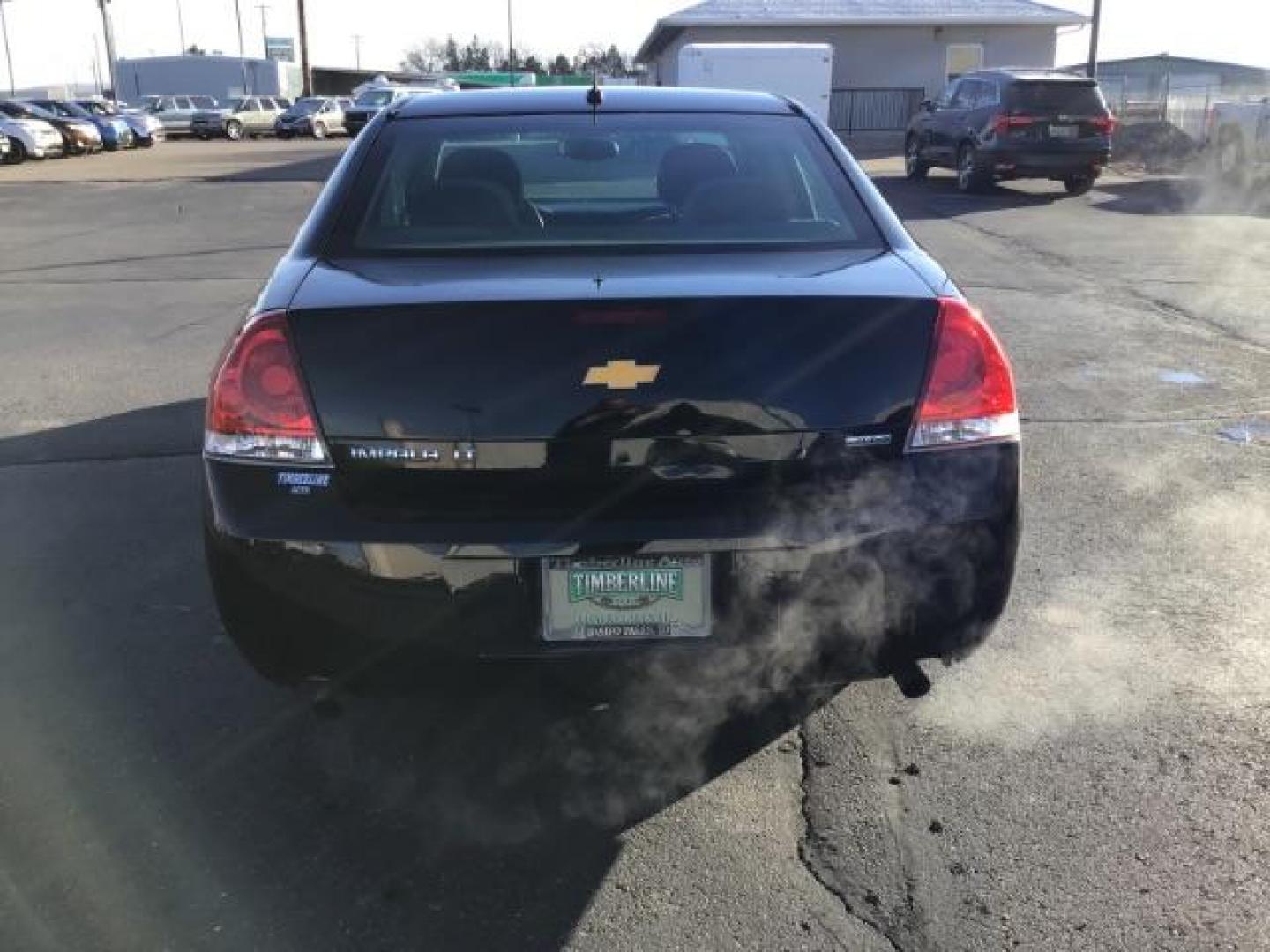 2015 BLACK /CLOTH Chevrolet Impala Limited LT (2G1WB5E30F1) with an 3.6L V6 DOHC 16V FFV engine, 6-Speed Automatic transmission, located at 1235 N Woodruff Ave., Idaho Falls, 83401, (208) 523-1053, 43.507172, -112.000488 - Photo#3