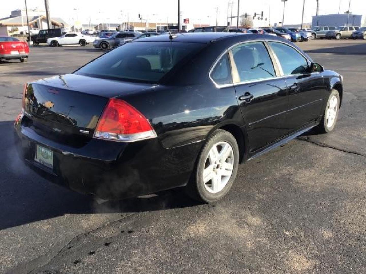 2015 BLACK /CLOTH Chevrolet Impala Limited LT (2G1WB5E30F1) with an 3.6L V6 DOHC 16V FFV engine, 6-Speed Automatic transmission, located at 1235 N Woodruff Ave., Idaho Falls, 83401, (208) 523-1053, 43.507172, -112.000488 - Photo#4