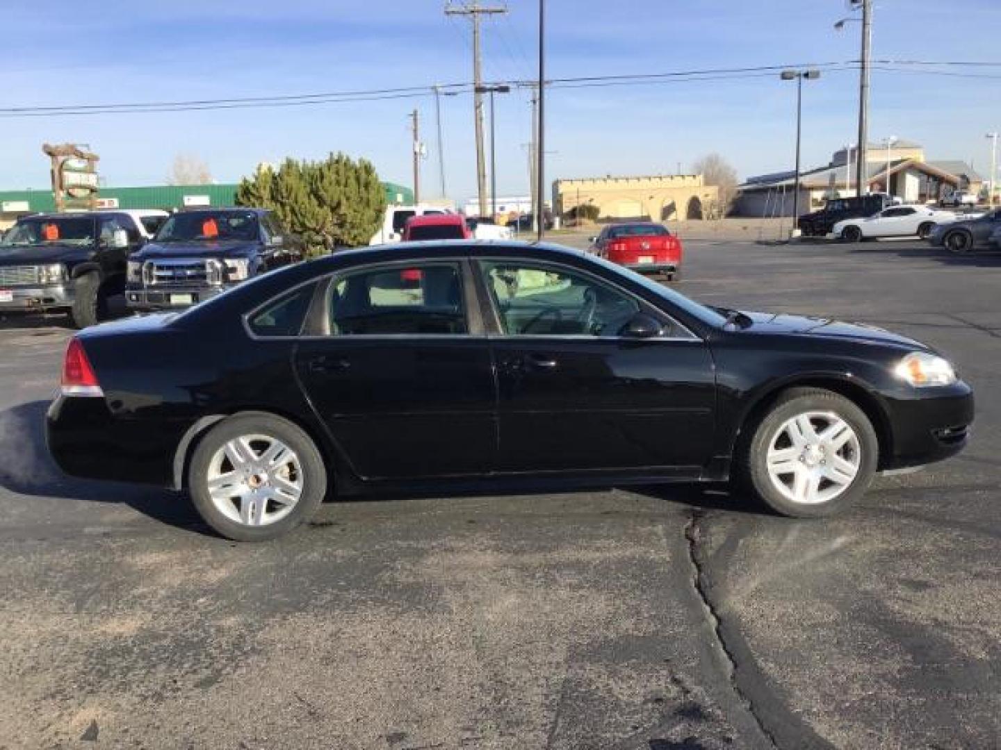 2015 BLACK /CLOTH Chevrolet Impala Limited LT (2G1WB5E30F1) with an 3.6L V6 DOHC 16V FFV engine, 6-Speed Automatic transmission, located at 1235 N Woodruff Ave., Idaho Falls, 83401, (208) 523-1053, 43.507172, -112.000488 - Photo#5