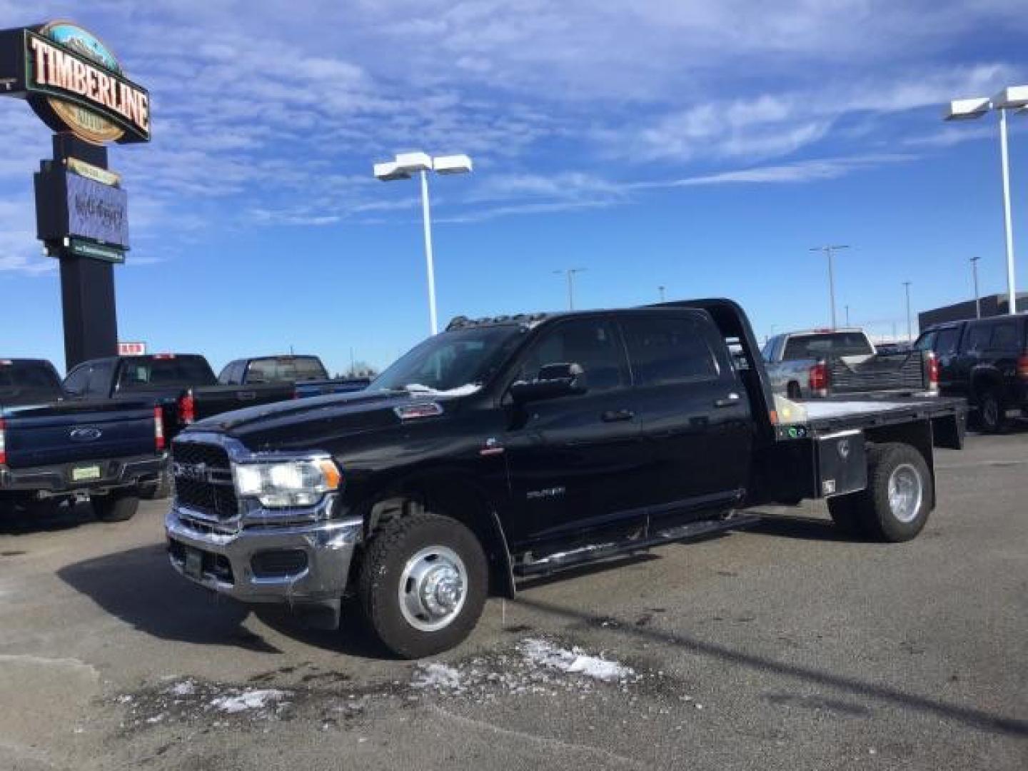 2020 BLACK /CLOTH RAM 3500 Tradesman Crew Cab 4WD DRW (3C63RRGL3LG) with an 6.7L L6 OHV 24V TURBO DIESEL engine, 6-Speed Automatic transmission, located at 1235 N Woodruff Ave., Idaho Falls, 83401, (208) 523-1053, 43.507172, -112.000488 - this 2020 Ram 3500 SLT, has a 6.7L Diesel motor. It has 105,000 miles. It comes with a flatbed with turnover ball. Comes with cloth interior, blue tooth audio, power door locks, power windows and integrated brake control. At Timberline Auto it is always easy to find a great deal on your next vehicle - Photo#0