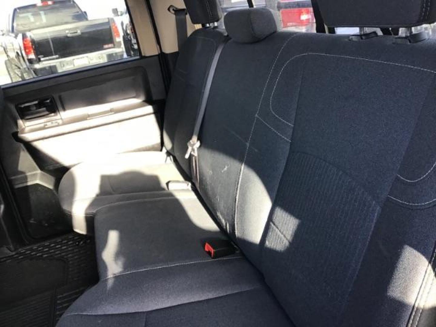 2020 BLACK /CLOTH RAM 3500 Tradesman Crew Cab 4WD DRW (3C63RRGL3LG) with an 6.7L L6 OHV 24V TURBO DIESEL engine, 6-Speed Automatic transmission, located at 1235 N Woodruff Ave., Idaho Falls, 83401, (208) 523-1053, 43.507172, -112.000488 - this 2020 Ram 3500 SLT, has a 6.7L Diesel motor. It has 105,000 miles. It comes with a flatbed with turnover ball. Comes with cloth interior, blue tooth audio, power door locks, power windows and integrated brake control. At Timberline Auto it is always easy to find a great deal on your next vehicle - Photo#20