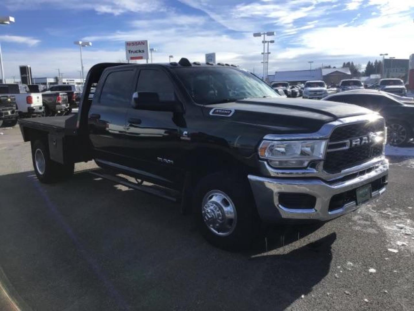 2020 BLACK /CLOTH RAM 3500 Tradesman Crew Cab 4WD DRW (3C63RRGL3LG) with an 6.7L L6 OHV 24V TURBO DIESEL engine, 6-Speed Automatic transmission, located at 1235 N Woodruff Ave., Idaho Falls, 83401, (208) 523-1053, 43.507172, -112.000488 - this 2020 Ram 3500 SLT, has a 6.7L Diesel motor. It has 105,000 miles. It comes with a flatbed with turnover ball. Comes with cloth interior, blue tooth audio, power door locks, power windows and integrated brake control. At Timberline Auto it is always easy to find a great deal on your next vehicle - Photo#6