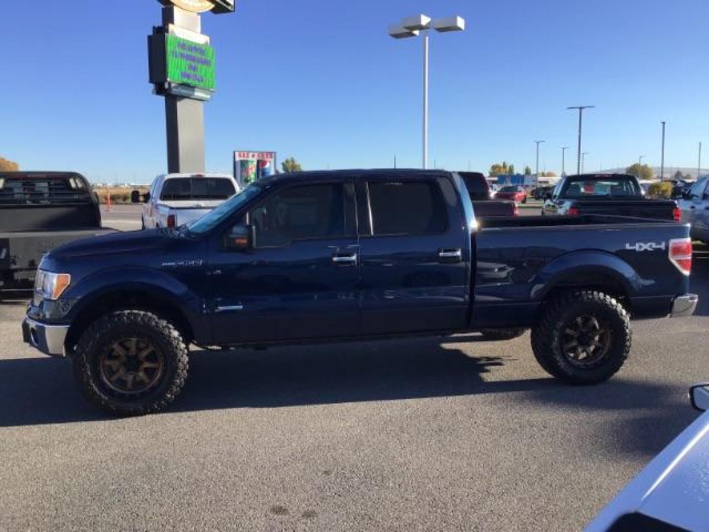 2014 Blue Jeans Metallic /Steel Gray Ford F-150 XLT SuperCrew 6.5-ft. Bed 4WD (1FTFW1ET2EK) with an 3.5L V6 TURBO engine, 6-Speed Automatic transmission, located at 1235 N Woodruff Ave., Idaho Falls, 83401, (208) 523-1053, 43.507172, -112.000488 - This 2014 Ford F150 XLT, has the 3.5L V6 motor. It only has 54,814 miles. It has keyless entry, bluetooth, and back up camera. At Timberline Auto it is always easy to find a great deal on your next vehicle! Our experienced sales staff can help find the right vehicle that will fit your needs. Our kn - Photo#1