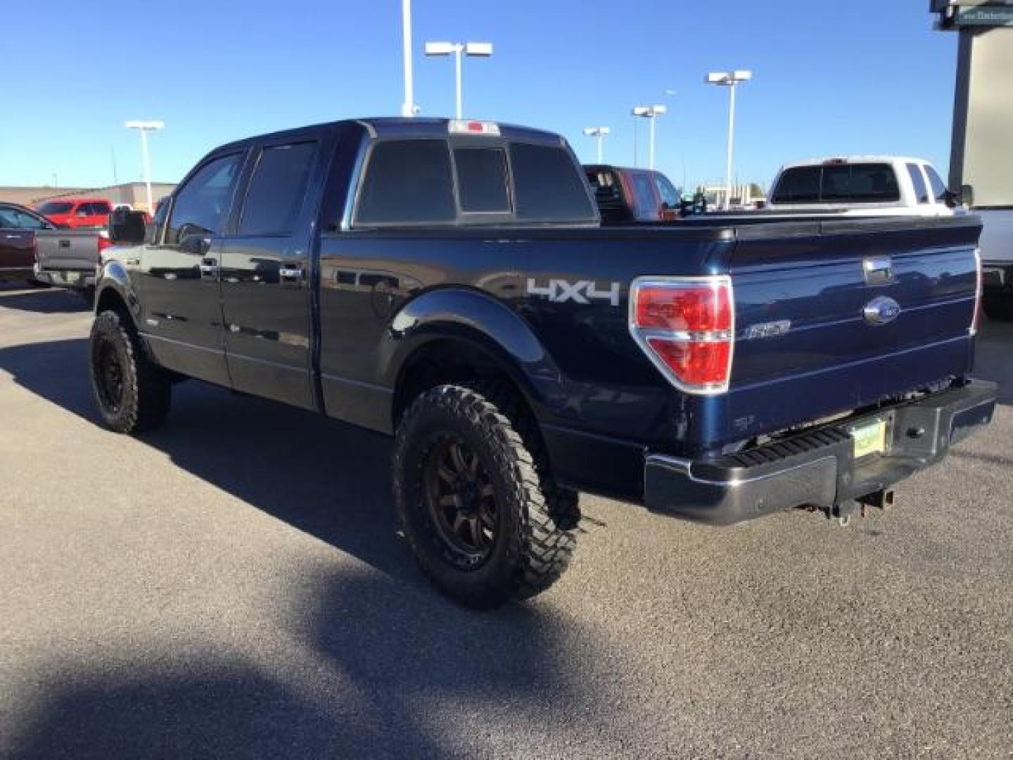 2014 Blue Jeans Metallic /Steel Gray Ford F-150 XLT SuperCrew 6.5-ft. Bed 4WD (1FTFW1ET2EK) with an 3.5L V6 TURBO engine, 6-Speed Automatic transmission, located at 1235 N Woodruff Ave., Idaho Falls, 83401, (208) 523-1053, 43.507172, -112.000488 - This 2014 Ford F150 XLT, has the 3.5L V6 motor. It only has 54,814 miles. It has keyless entry, bluetooth, and back up camera. At Timberline Auto it is always easy to find a great deal on your next vehicle! Our experienced sales staff can help find the right vehicle that will fit your needs. Our kn - Photo#2