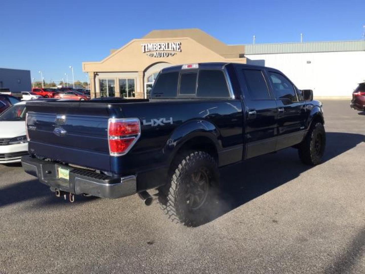 2014 Blue Jeans Metallic /Steel Gray Ford F-150 XLT SuperCrew 6.5-ft. Bed 4WD (1FTFW1ET2EK) with an 3.5L V6 TURBO engine, 6-Speed Automatic transmission, located at 1235 N Woodruff Ave., Idaho Falls, 83401, (208) 523-1053, 43.507172, -112.000488 - This 2014 Ford F150 XLT, has the 3.5L V6 motor. It only has 54,814 miles. It has keyless entry, bluetooth, and back up camera. At Timberline Auto it is always easy to find a great deal on your next vehicle! Our experienced sales staff can help find the right vehicle that will fit your needs. Our kn - Photo#4