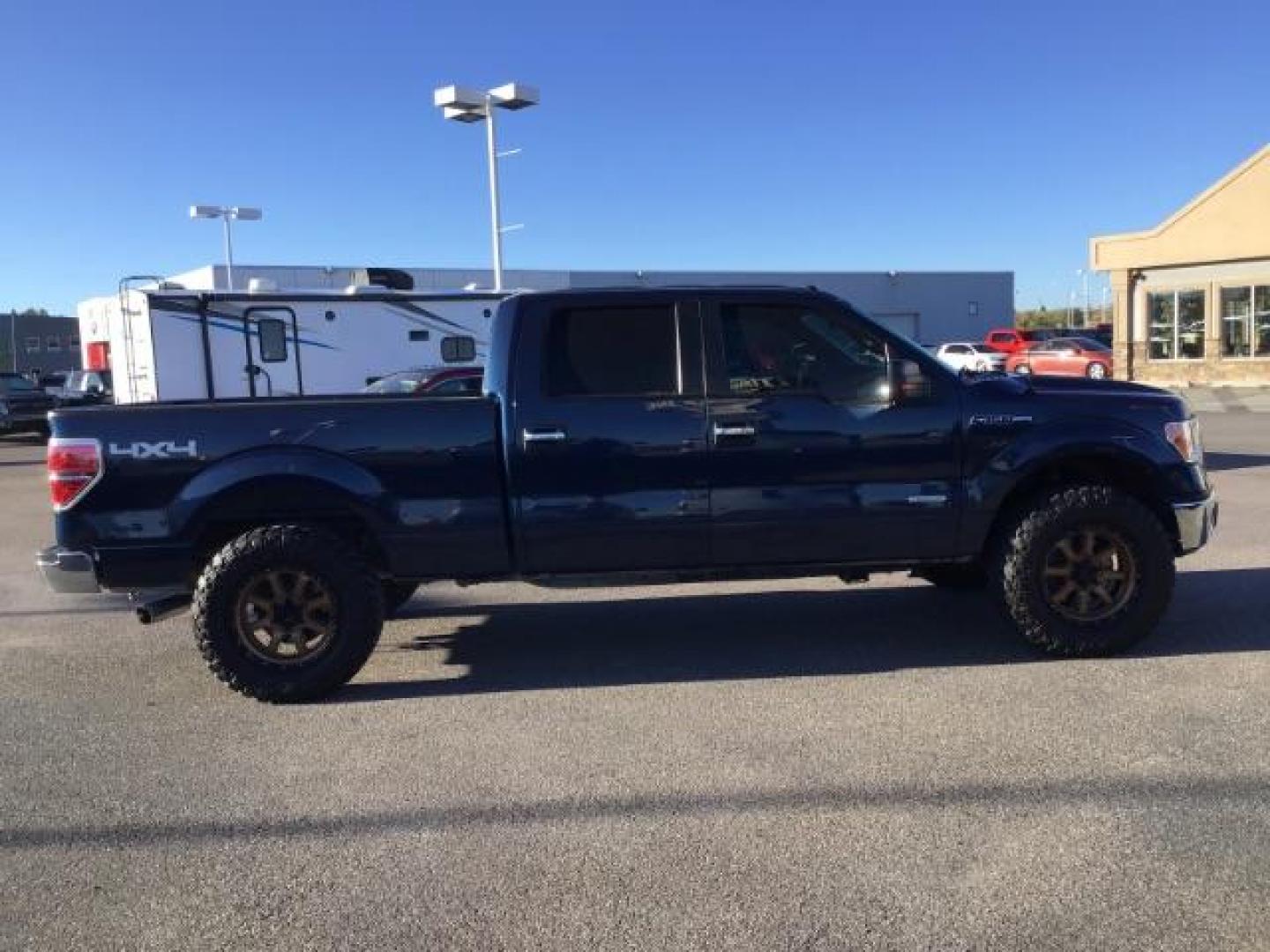 2014 Blue Jeans Metallic /Steel Gray Ford F-150 XLT SuperCrew 6.5-ft. Bed 4WD (1FTFW1ET2EK) with an 3.5L V6 TURBO engine, 6-Speed Automatic transmission, located at 1235 N Woodruff Ave., Idaho Falls, 83401, (208) 523-1053, 43.507172, -112.000488 - This 2014 Ford F150 XLT, has the 3.5L V6 motor. It only has 54,814 miles. It has keyless entry, bluetooth, and back up camera. At Timberline Auto it is always easy to find a great deal on your next vehicle! Our experienced sales staff can help find the right vehicle that will fit your needs. Our kn - Photo#5