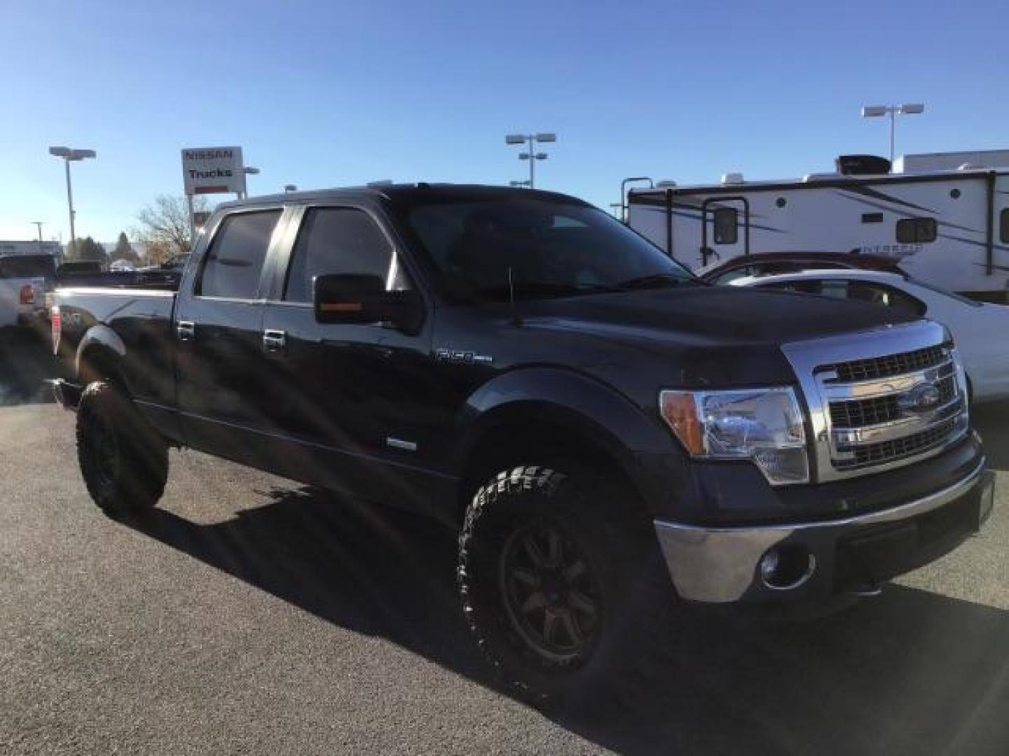 2014 Blue Jeans Metallic /Steel Gray Ford F-150 XLT SuperCrew 6.5-ft. Bed 4WD (1FTFW1ET2EK) with an 3.5L V6 TURBO engine, 6-Speed Automatic transmission, located at 1235 N Woodruff Ave., Idaho Falls, 83401, (208) 523-1053, 43.507172, -112.000488 - This 2014 Ford F150 XLT, has the 3.5L V6 motor. It only has 54,814 miles. It has keyless entry, bluetooth, and back up camera. At Timberline Auto it is always easy to find a great deal on your next vehicle! Our experienced sales staff can help find the right vehicle that will fit your needs. Our kn - Photo#6