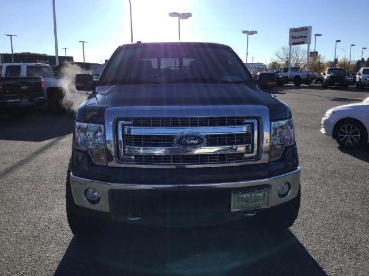 2014 Blue Jeans Metallic /Steel Gray Ford F-150 XLT SuperCrew 6.5-ft. Bed 4WD (1FTFW1ET2EK) with an 3.5L V6 TURBO engine, 6-Speed Automatic transmission, located at 1235 N Woodruff Ave., Idaho Falls, 83401, (208) 523-1053, 43.507172, -112.000488 - This 2014 Ford F150 XLT, has the 3.5L V6 motor. It only has 54,814 miles. It has keyless entry, bluetooth, and back up camera. At Timberline Auto it is always easy to find a great deal on your next vehicle! Our experienced sales staff can help find the right vehicle that will fit your needs. Our kn - Photo#7