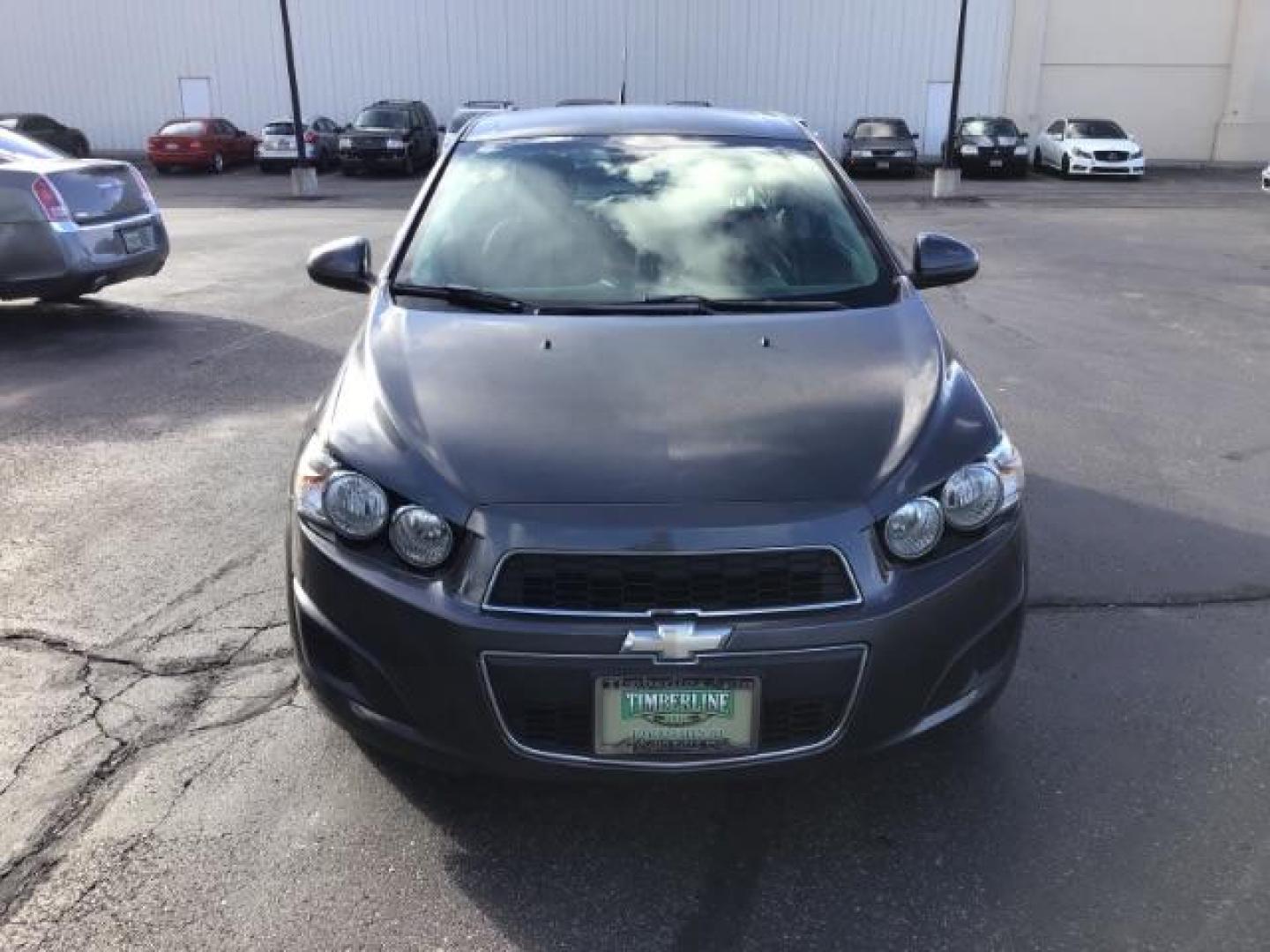 2013 Black Granite Metallic Chevrolet Sonic LT Auto 5-Door (1G1JC6SG7D4) with an 1.8L L4 DOHC 24V engine, 6-Speed Automatic transmission, located at 1235 N Woodruff Ave., Idaho Falls, 83401, (208) 523-1053, 43.507172, -112.000488 - This 2013 Chevrolet Sonic, has the 4 cylinder motor. It has 95,000 miles. It comes with Steering wheel audio controls, cruise control, bluetooth audio, and CD player. At Timberline Auto it is always easy to find a great deal on your next vehicle! Our experienced sales staff can help find the right v - Photo#7