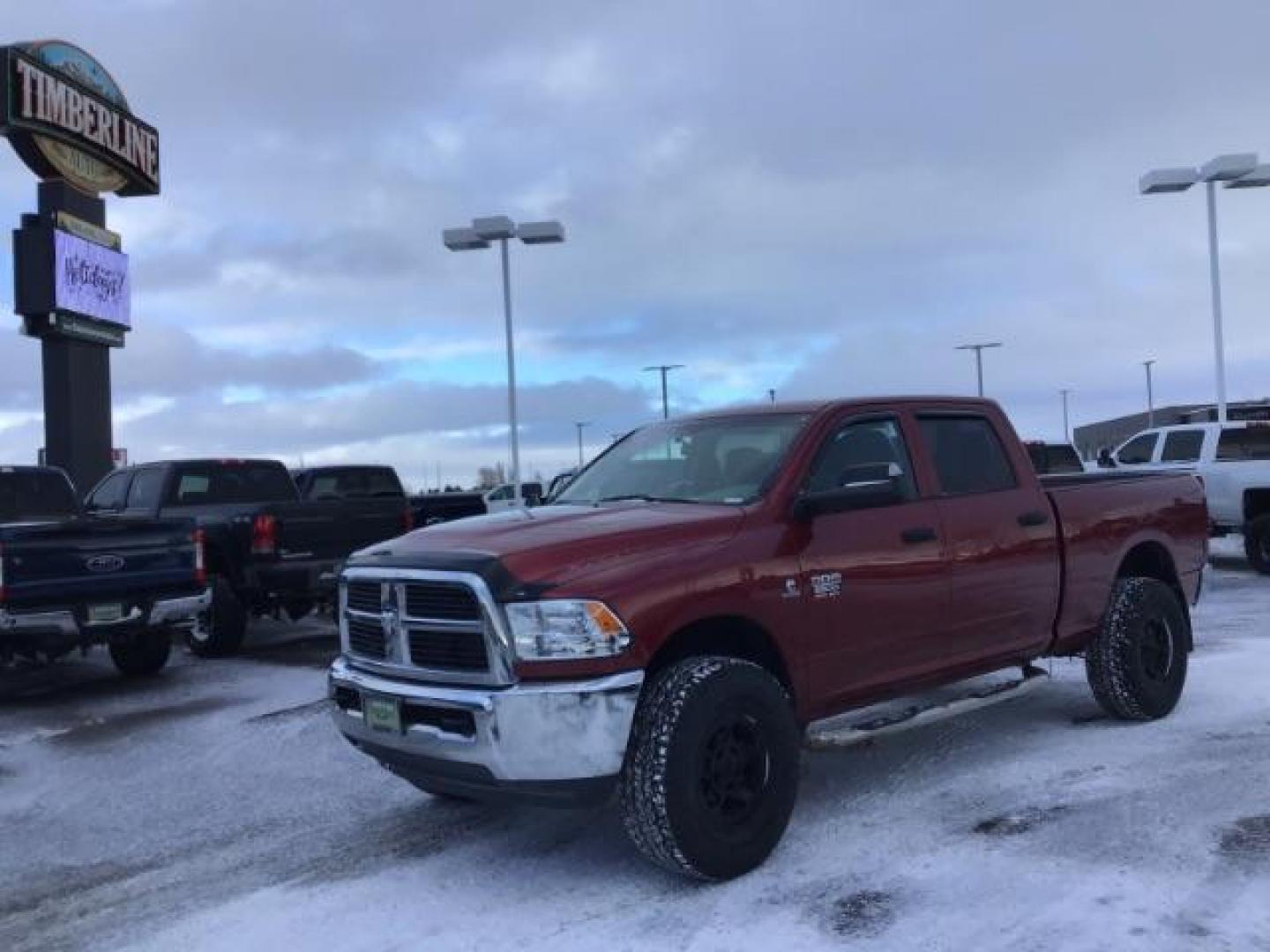 2012 Deep Cherry Red Crystal Pearl /Dark Slate/Medium Graystone Cloth Interior RAM 2500 ST Crew Cab SWB 4WD (3C6UD5CL6CG) with an 6.7L L6 OHV 24V TURBO DIESEL engine, 6-Speed Automatic transmission, located at 1235 N Woodruff Ave., Idaho Falls, 83401, (208) 523-1053, 43.507172, -112.000488 - This 2012 Ram 2500 ST 4x4, has the 6.7L Diesel motor. It has 175,000 miles. Comes with Cloth interior, AM/FM stereo, bluetooth audio, and power windows. At Timberline Auto it is always easy to find a great deal on your next vehicle! Our experienced sales staff can help find the right vehicle that wi - Photo#0