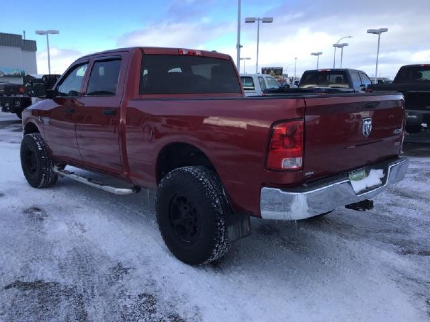 2012 Deep Cherry Red Crystal Pearl /Dark Slate/Medium Graystone Cloth Interior RAM 2500 ST Crew Cab SWB 4WD (3C6UD5CL6CG) with an 6.7L L6 OHV 24V TURBO DIESEL engine, 6-Speed Automatic transmission, located at 1235 N Woodruff Ave., Idaho Falls, 83401, (208) 523-1053, 43.507172, -112.000488 - This 2012 Ram 2500 ST 4x4, has the 6.7L Diesel motor. It has 175,000 miles. Comes with Cloth interior, AM/FM stereo, bluetooth audio, and power windows. At Timberline Auto it is always easy to find a great deal on your next vehicle! Our experienced sales staff can help find the right vehicle that wi - Photo#2