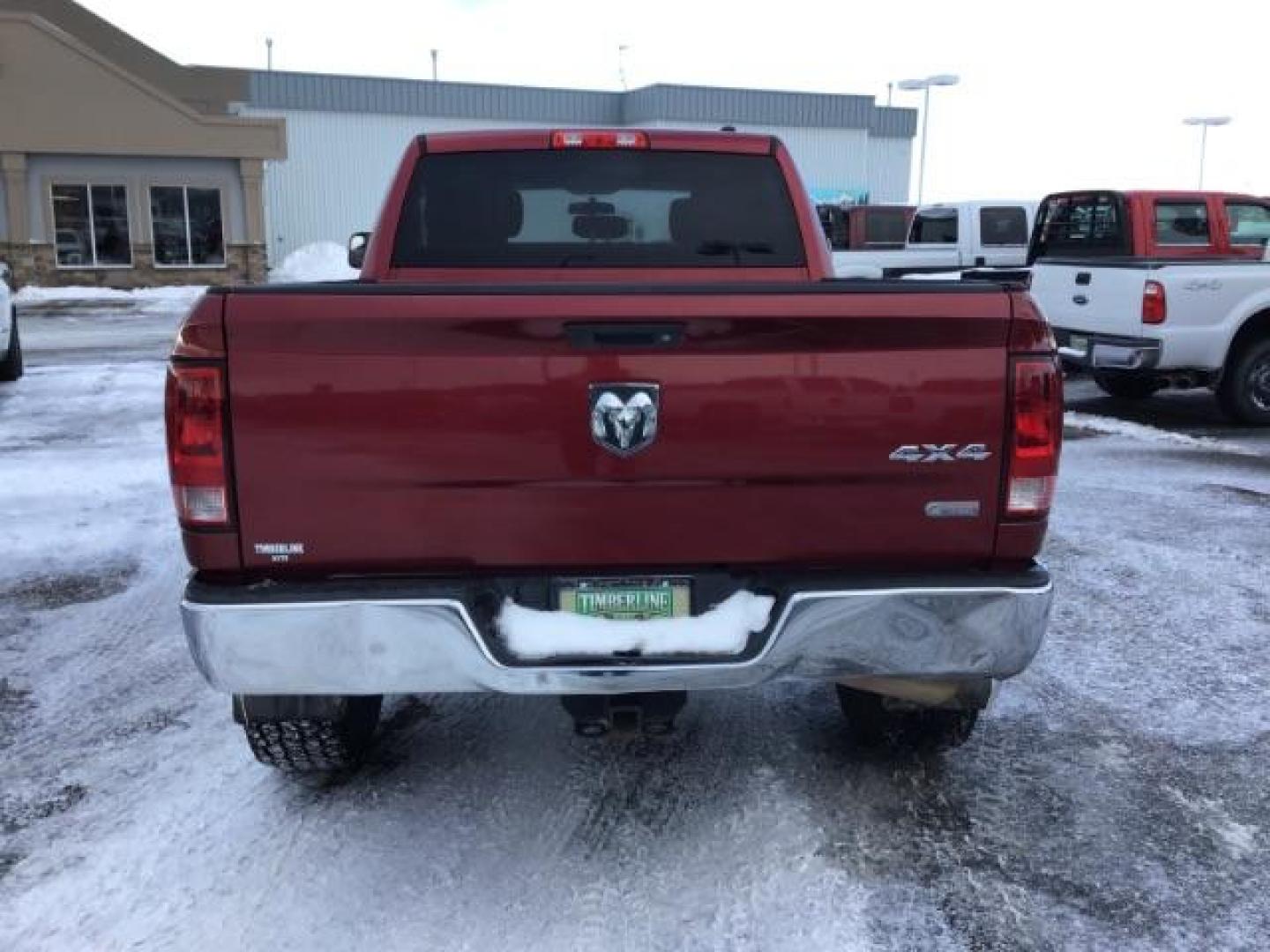 2012 Deep Cherry Red Crystal Pearl /Dark Slate/Medium Graystone Cloth Interior RAM 2500 ST Crew Cab SWB 4WD (3C6UD5CL6CG) with an 6.7L L6 OHV 24V TURBO DIESEL engine, 6-Speed Automatic transmission, located at 1235 N Woodruff Ave., Idaho Falls, 83401, (208) 523-1053, 43.507172, -112.000488 - This 2012 Ram 2500 ST 4x4, has the 6.7L Diesel motor. It has 175,000 miles. Comes with Cloth interior, AM/FM stereo, bluetooth audio, and power windows. At Timberline Auto it is always easy to find a great deal on your next vehicle! Our experienced sales staff can help find the right vehicle that wi - Photo#3