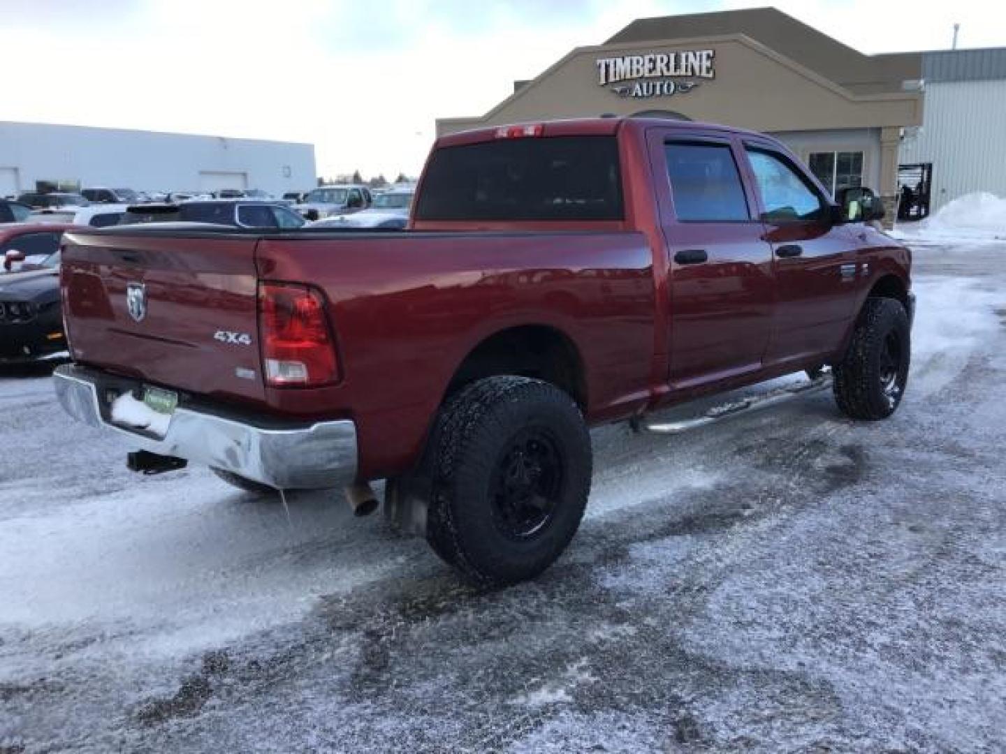 2012 Deep Cherry Red Crystal Pearl /Dark Slate/Medium Graystone Cloth Interior RAM 2500 ST Crew Cab SWB 4WD (3C6UD5CL6CG) with an 6.7L L6 OHV 24V TURBO DIESEL engine, 6-Speed Automatic transmission, located at 1235 N Woodruff Ave., Idaho Falls, 83401, (208) 523-1053, 43.507172, -112.000488 - This 2012 Ram 2500 ST 4x4, has the 6.7L Diesel motor. It has 175,000 miles. Comes with Cloth interior, AM/FM stereo, bluetooth audio, and power windows. At Timberline Auto it is always easy to find a great deal on your next vehicle! Our experienced sales staff can help find the right vehicle that wi - Photo#4