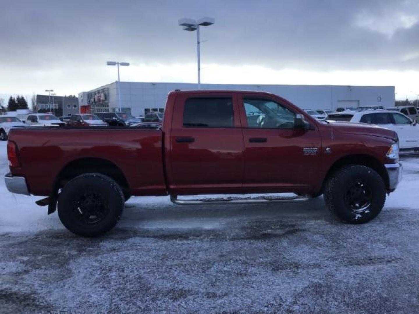 2012 Deep Cherry Red Crystal Pearl /Dark Slate/Medium Graystone Cloth Interior RAM 2500 ST Crew Cab SWB 4WD (3C6UD5CL6CG) with an 6.7L L6 OHV 24V TURBO DIESEL engine, 6-Speed Automatic transmission, located at 1235 N Woodruff Ave., Idaho Falls, 83401, (208) 523-1053, 43.507172, -112.000488 - This 2012 Ram 2500 ST 4x4, has the 6.7L Diesel motor. It has 175,000 miles. Comes with Cloth interior, AM/FM stereo, bluetooth audio, and power windows. At Timberline Auto it is always easy to find a great deal on your next vehicle! Our experienced sales staff can help find the right vehicle that wi - Photo#5