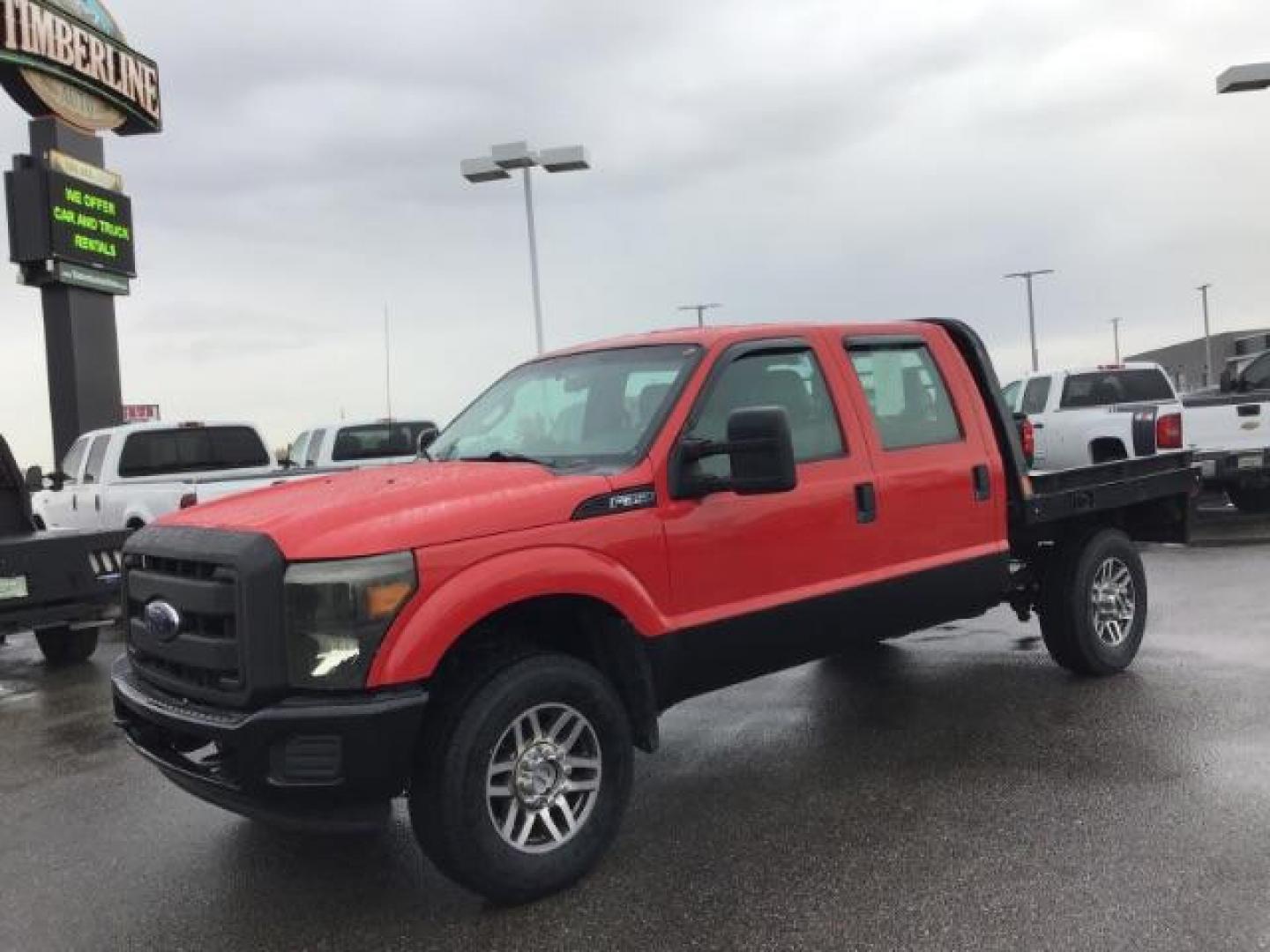 2013 Vermillion Red /Steel Vinyl Interior Ford F-350 SD XL Crew Cab 4WD (1FT8W3B60DE) with an 6.2L V8 OHV 16V engine, 6-Speed Automatic transmission, located at 1235 N Woodruff Ave., Idaho Falls, 83401, (208) 523-1053, 43.507172, -112.000488 - This 2013 Ford F350 XL. Has the 6.2L V8 motor. It only has 99,446 miles. It has the Flat bed, and plenty of room to haul people around. At Timberline Auto it is always easy to find a great deal on your next vehicle! Our experienced sales staff can help find the right vehicle that will fit your needs - Photo#0