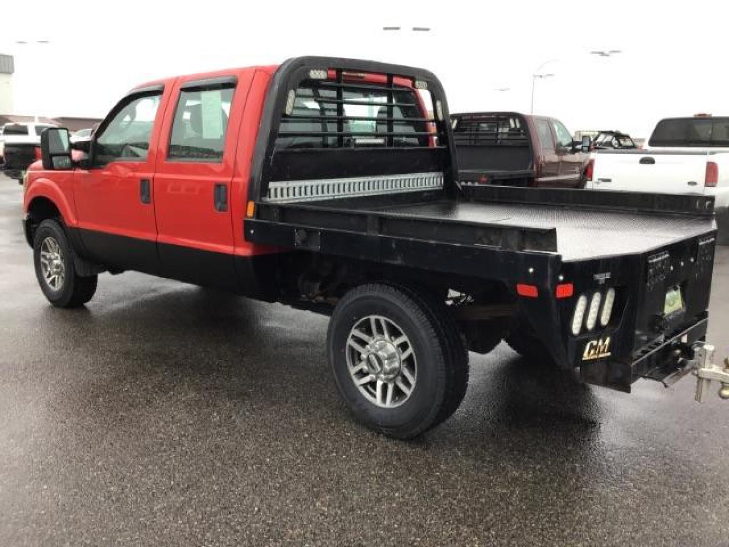 2013 Vermillion Red /Steel Vinyl Interior Ford F-350 SD XL Crew Cab 4WD (1FT8W3B60DE) with an 6.2L V8 OHV 16V engine, 6-Speed Automatic transmission, located at 1235 N Woodruff Ave., Idaho Falls, 83401, (208) 523-1053, 43.507172, -112.000488 - This 2013 Ford F350 XL. Has the 6.2L V8 motor. It only has 99,446 miles. It has the Flat bed, and plenty of room to haul people around. At Timberline Auto it is always easy to find a great deal on your next vehicle! Our experienced sales staff can help find the right vehicle that will fit your needs - Photo#2