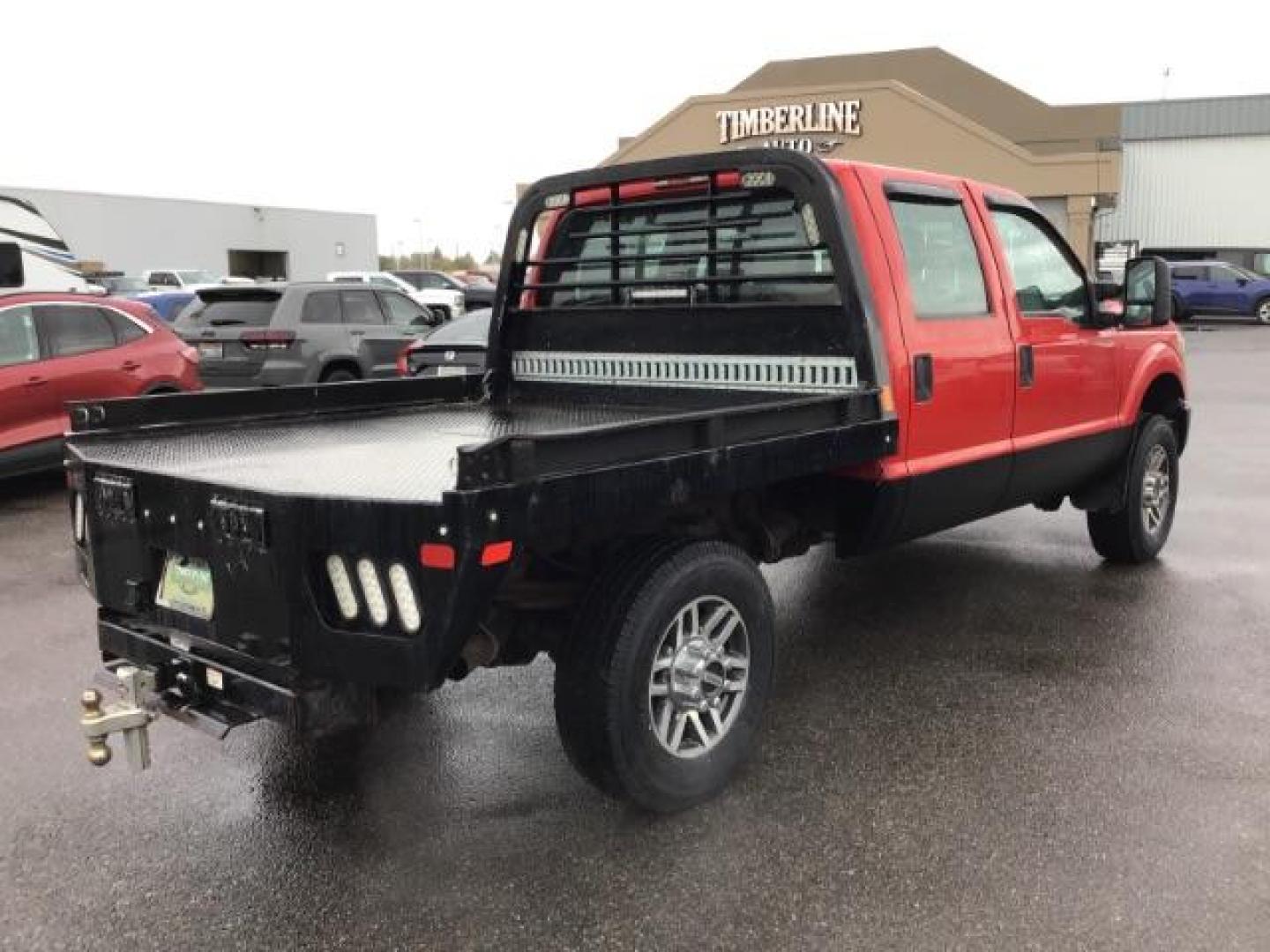 2013 Vermillion Red /Steel Vinyl Interior Ford F-350 SD XL Crew Cab 4WD (1FT8W3B60DE) with an 6.2L V8 OHV 16V engine, 6-Speed Automatic transmission, located at 1235 N Woodruff Ave., Idaho Falls, 83401, (208) 523-1053, 43.507172, -112.000488 - This 2013 Ford F350 XL. Has the 6.2L V8 motor. It only has 99,446 miles. It has the Flat bed, and plenty of room to haul people around. At Timberline Auto it is always easy to find a great deal on your next vehicle! Our experienced sales staff can help find the right vehicle that will fit your needs - Photo#4