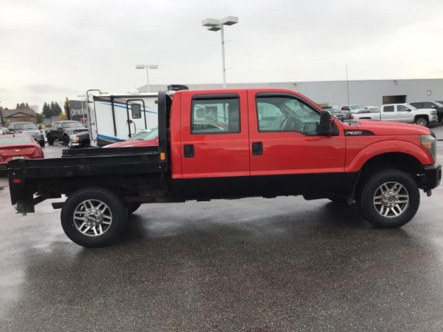 2013 Vermillion Red /Steel Vinyl Interior Ford F-350 SD XL Crew Cab 4WD (1FT8W3B60DE) with an 6.2L V8 OHV 16V engine, 6-Speed Automatic transmission, located at 1235 N Woodruff Ave., Idaho Falls, 83401, (208) 523-1053, 43.507172, -112.000488 - This 2013 Ford F350 XL. Has the 6.2L V8 motor. It only has 99,446 miles. It has the Flat bed, and plenty of room to haul people around. At Timberline Auto it is always easy to find a great deal on your next vehicle! Our experienced sales staff can help find the right vehicle that will fit your needs - Photo#5