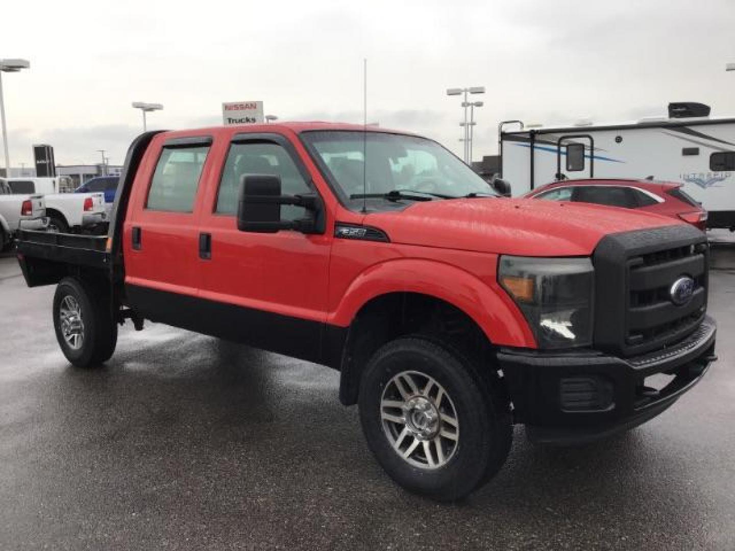 2013 Vermillion Red /Steel Vinyl Interior Ford F-350 SD XL Crew Cab 4WD (1FT8W3B60DE) with an 6.2L V8 OHV 16V engine, 6-Speed Automatic transmission, located at 1235 N Woodruff Ave., Idaho Falls, 83401, (208) 523-1053, 43.507172, -112.000488 - This 2013 Ford F350 XL. Has the 6.2L V8 motor. It only has 99,446 miles. It has the Flat bed, and plenty of room to haul people around. At Timberline Auto it is always easy to find a great deal on your next vehicle! Our experienced sales staff can help find the right vehicle that will fit your needs - Photo#6