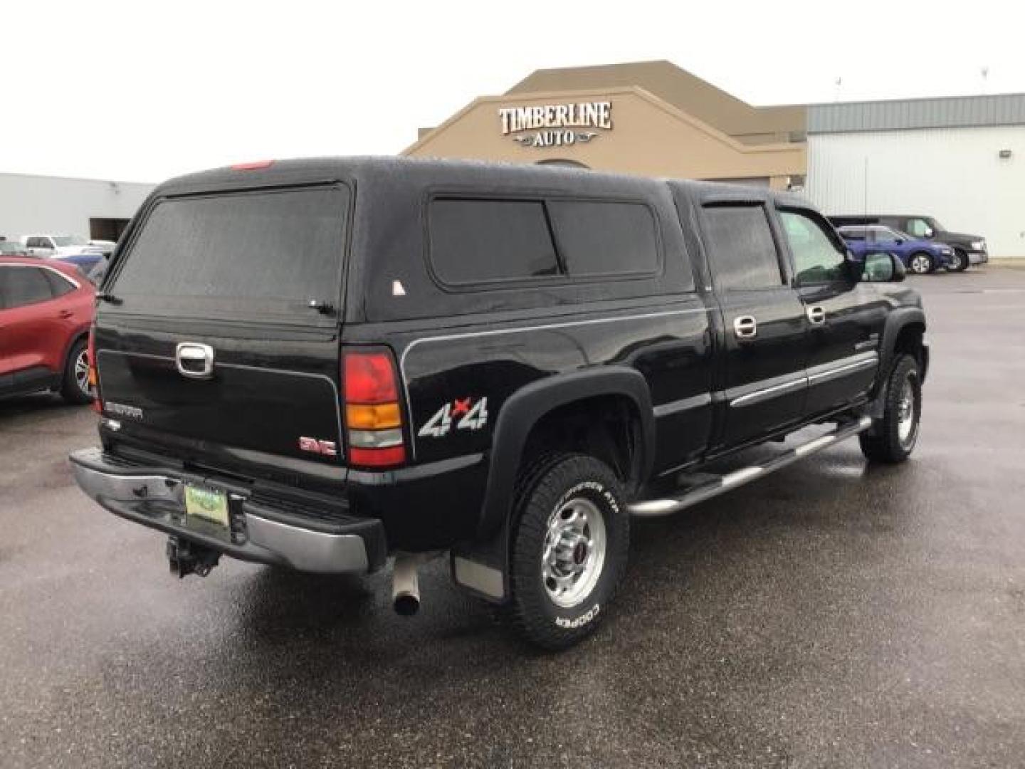 2005 Onyx Black GMC Sierra 2500HD SLT Crew Cab Short Bed 4WD (1GTHK23275F) with an 6.6L V8 OHV 32V TURBO DIESEL engine, 5-Speed Automatic transmission, located at 1235 N Woodruff Ave., Idaho Falls, 83401, (208) 523-1053, 43.507172, -112.000488 - This 2005 GMC 2500 SLT, has the 6.6L Diesel motor. It only has 117,477 miles. I has leather interior, heated seats, and Bose stereo system. At Timberline Auto it is always easy to find a great deal on your next vehicle! Our experienced sales staff can help find the right vehicle that will fit your n - Photo#3