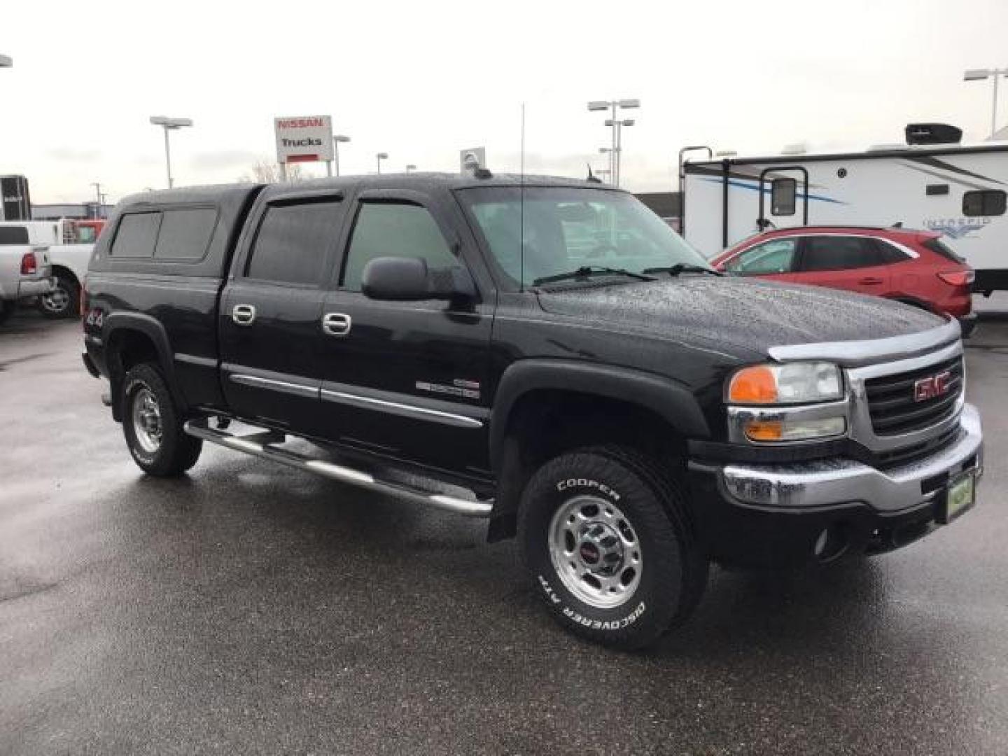 2005 Onyx Black GMC Sierra 2500HD SLT Crew Cab Short Bed 4WD (1GTHK23275F) with an 6.6L V8 OHV 32V TURBO DIESEL engine, 5-Speed Automatic transmission, located at 1235 N Woodruff Ave., Idaho Falls, 83401, (208) 523-1053, 43.507172, -112.000488 - This 2005 GMC 2500 SLT, has the 6.6L Diesel motor. It only has 117,477 miles. I has leather interior, heated seats, and Bose stereo system. At Timberline Auto it is always easy to find a great deal on your next vehicle! Our experienced sales staff can help find the right vehicle that will fit your n - Photo#5