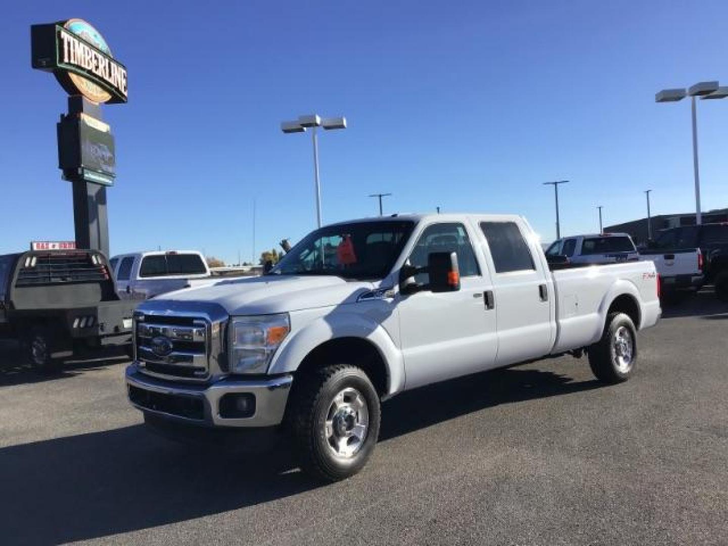 2015 Oxford White /Steel Ford F-250 SD XLT Crew Cab Long Bed 4WD (1FT7W2B65FE) with an 6.2L V8 OHV 16V engine, 6-Speed Automatic transmission, located at 1235 N Woodruff Ave., Idaho Falls, 83401, (208) 523-1053, 43.507172, -112.000488 - This 2015 Ford F250 XLT, comes with the 6.2L V8 gas motor. It has a 8 foot bed. Comes with Bluetooth, keyless entry, extended mirrors, remote start, and cloth seats. At Timberline Auto it is always easy to find a great deal on your next vehicle! Our experienced sales staff can help find the right v - Photo#0