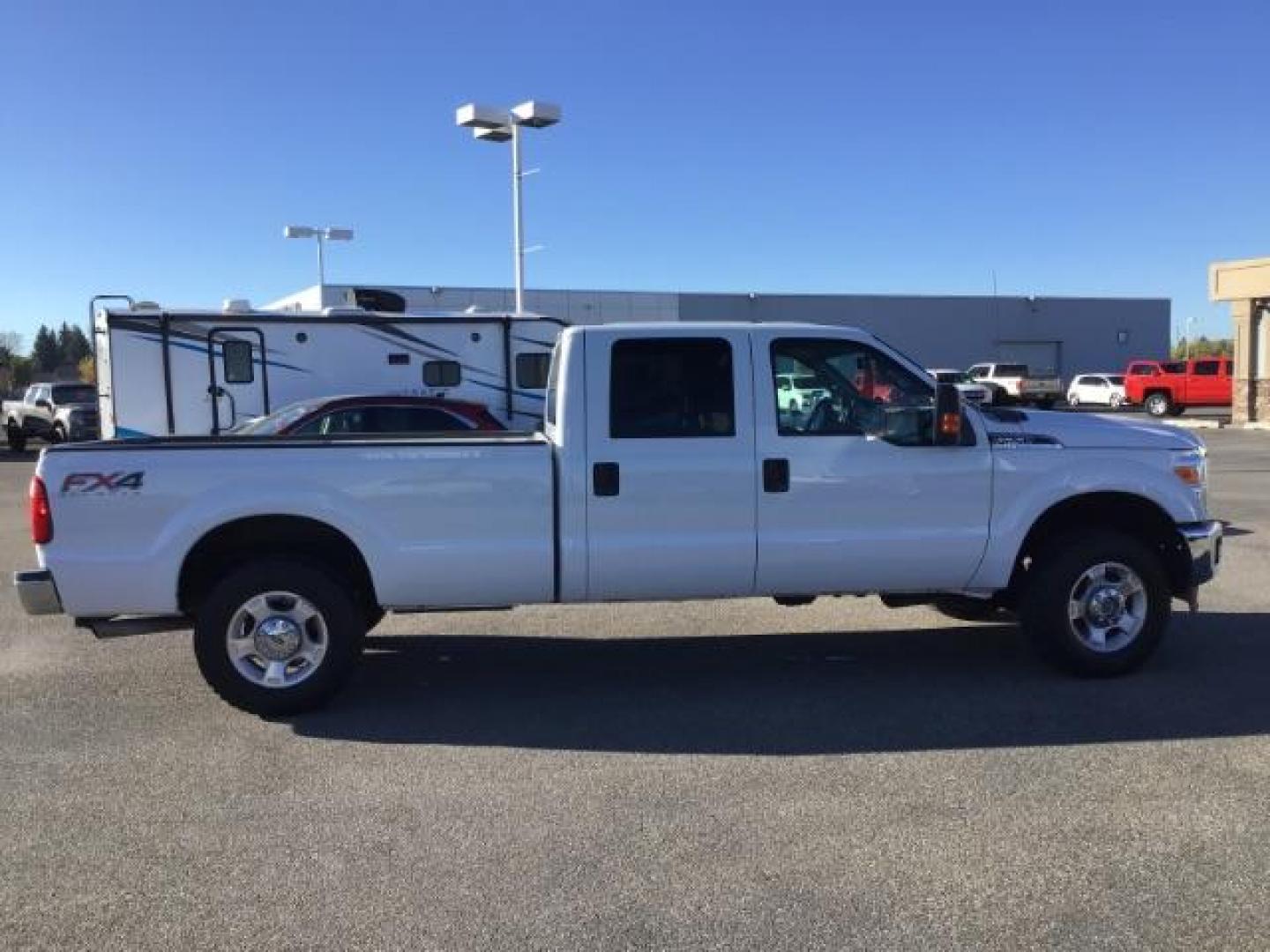 2015 Oxford White /Steel Ford F-250 SD XLT Crew Cab Long Bed 4WD (1FT7W2B65FE) with an 6.2L V8 OHV 16V engine, 6-Speed Automatic transmission, located at 1235 N Woodruff Ave., Idaho Falls, 83401, (208) 523-1053, 43.507172, -112.000488 - This 2015 Ford F250 XLT, comes with the 6.2L V8 gas motor. It has a 8 foot bed. Comes with Bluetooth, keyless entry, extended mirrors, remote start, and cloth seats. At Timberline Auto it is always easy to find a great deal on your next vehicle! Our experienced sales staff can help find the right v - Photo#5