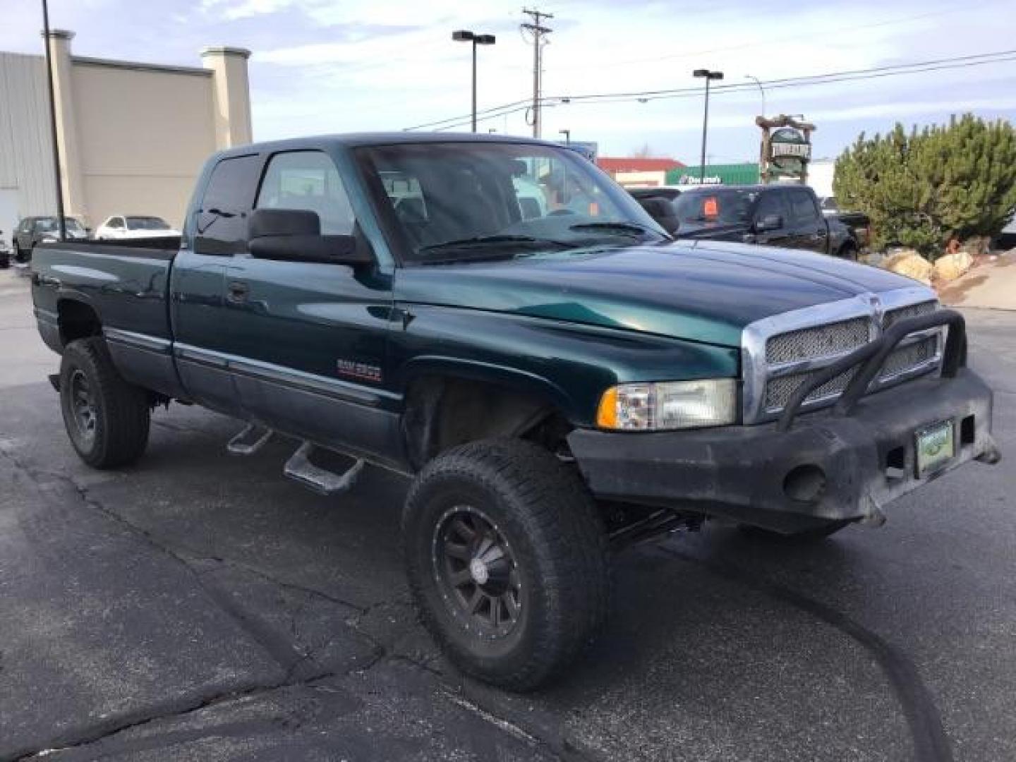 1998 GREEN /Mist Gray Cloth Dodge Ram 2500 Quad Cab 6.5-ft. Bed 4WD (1B7KF2360WJ) with an 5.9L L6 OHV 24V TURBO DIESEL engine, 5-Speed Manual transmission, located at 1235 N Woodruff Ave., Idaho Falls, 83401, (208) 523-1053, 43.507172, -112.000488 - At Timberline Auto it is always easy to find a great deal on your next vehicle! Our experienced sales staff can help find the right vehicle will fit your needs. Our knowledgeable finance department has options for almost any credit score. We offer many warranty contract options to protect you new pr - Photo#6